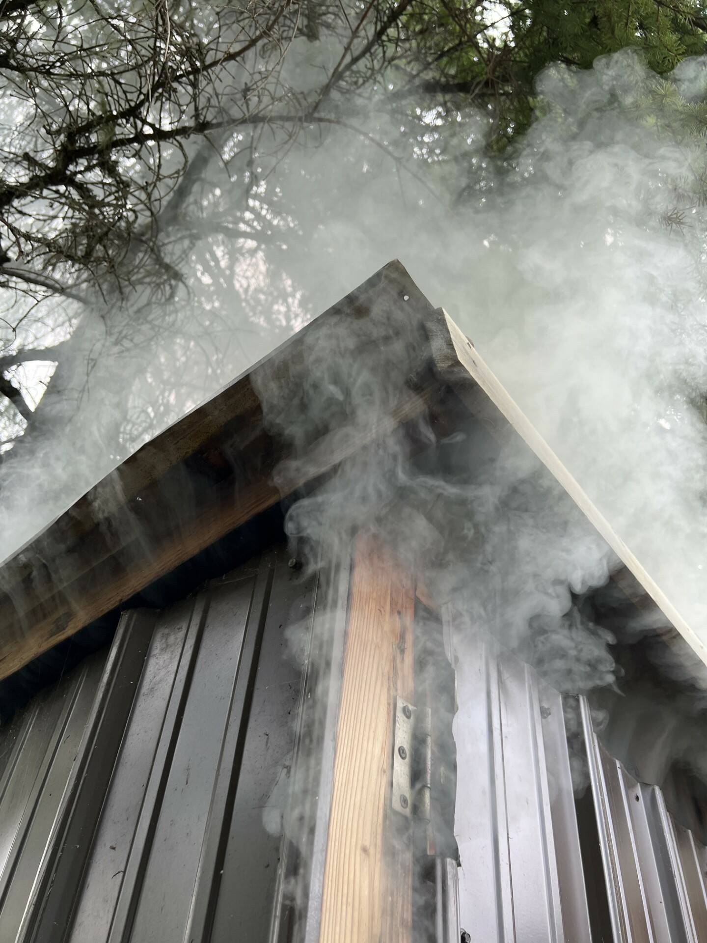 Smoking salmon in custom smokehouse built by Mickey Prescott in Wrangell. (Photo by Vivian Faith Prescott)