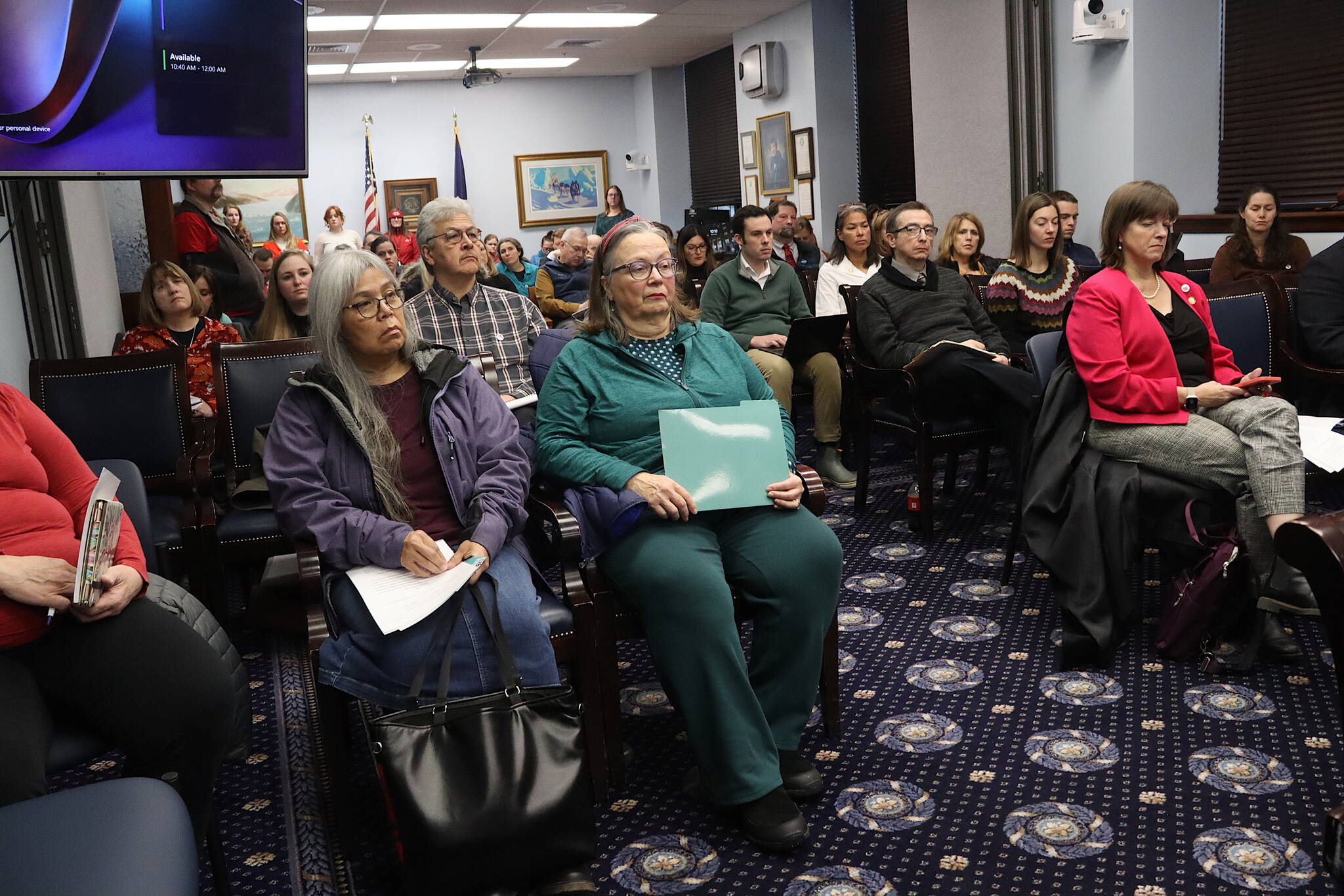 Educators, legislators and other people fill a meeting room at the Alaska State Capitol on Saturday as the House Rules Committee hears public testimony about an education bill. (Mark Sabbatini / Juneau Empire)