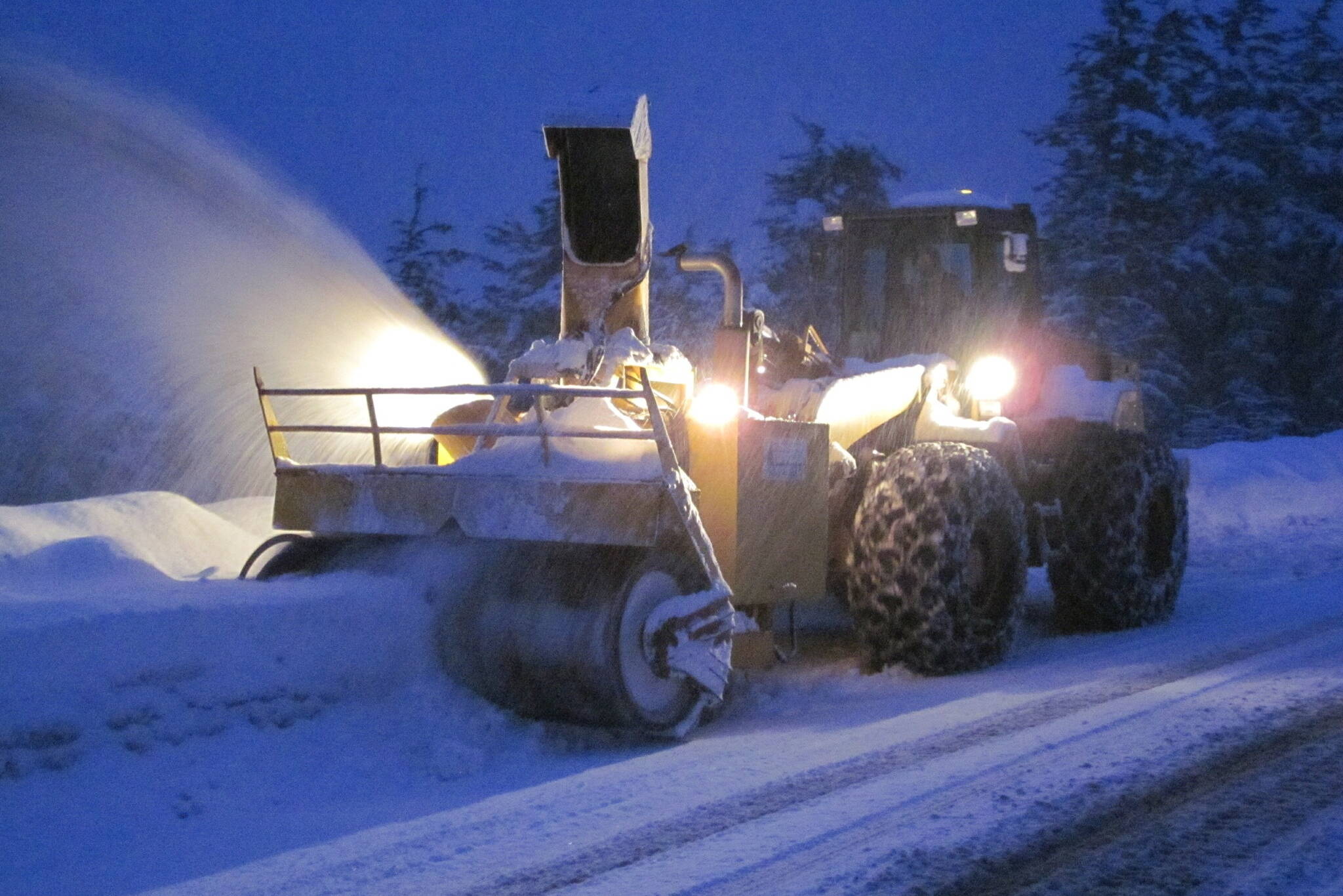 A plow clears snow from city streets on Sunday. (City and Borough of Juneau photo)