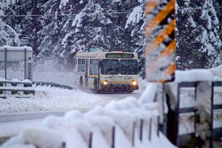 A Capital Transit bus navigates a plowed city street during this weeks storm. (City and Borough of Juneau photo)