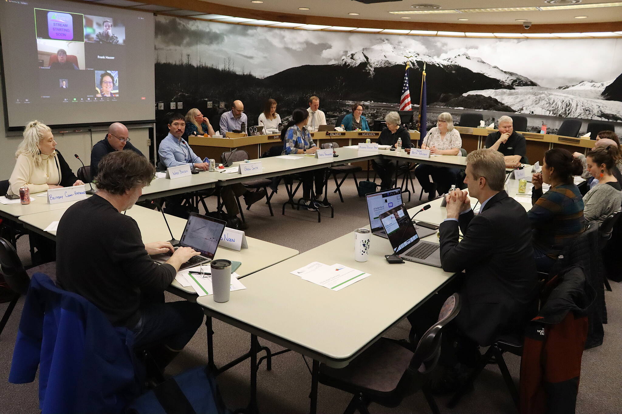 Members of the Juneau Assembly and Juneau Board of Education, along with top administrators for the city and school district, meet jointly to discuss the district’s financial crisis on Tuesday night at City Hall. (Mark Sabbatini / Juneau Empire)