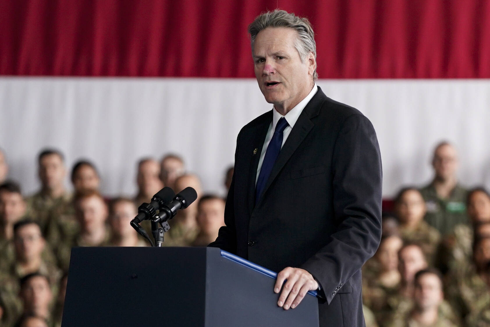 Gov. Mike Dunleavy speaks at Joint Base Elmendorf-Richardson to mark the anniversary of the Sept. 11 terrorist attacks, Sept. 11, 2023, in Anchorage. (AP Photo/Evan Vucci, File)