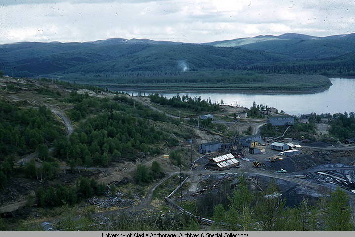 The Red Devil Mine, which produced mercury on and off from the 1930s to 1971, is seen from the air in 1960 in this archival photo from the University of Alaska Anchorages collection. The Bureau of Land Management has approved a plan to clean up what is considered the last remaining source of contamination: tailings spread over the property. (Photo by Don Grybeck/University of Alaska Anchorage Consortium Library archives and special collections)