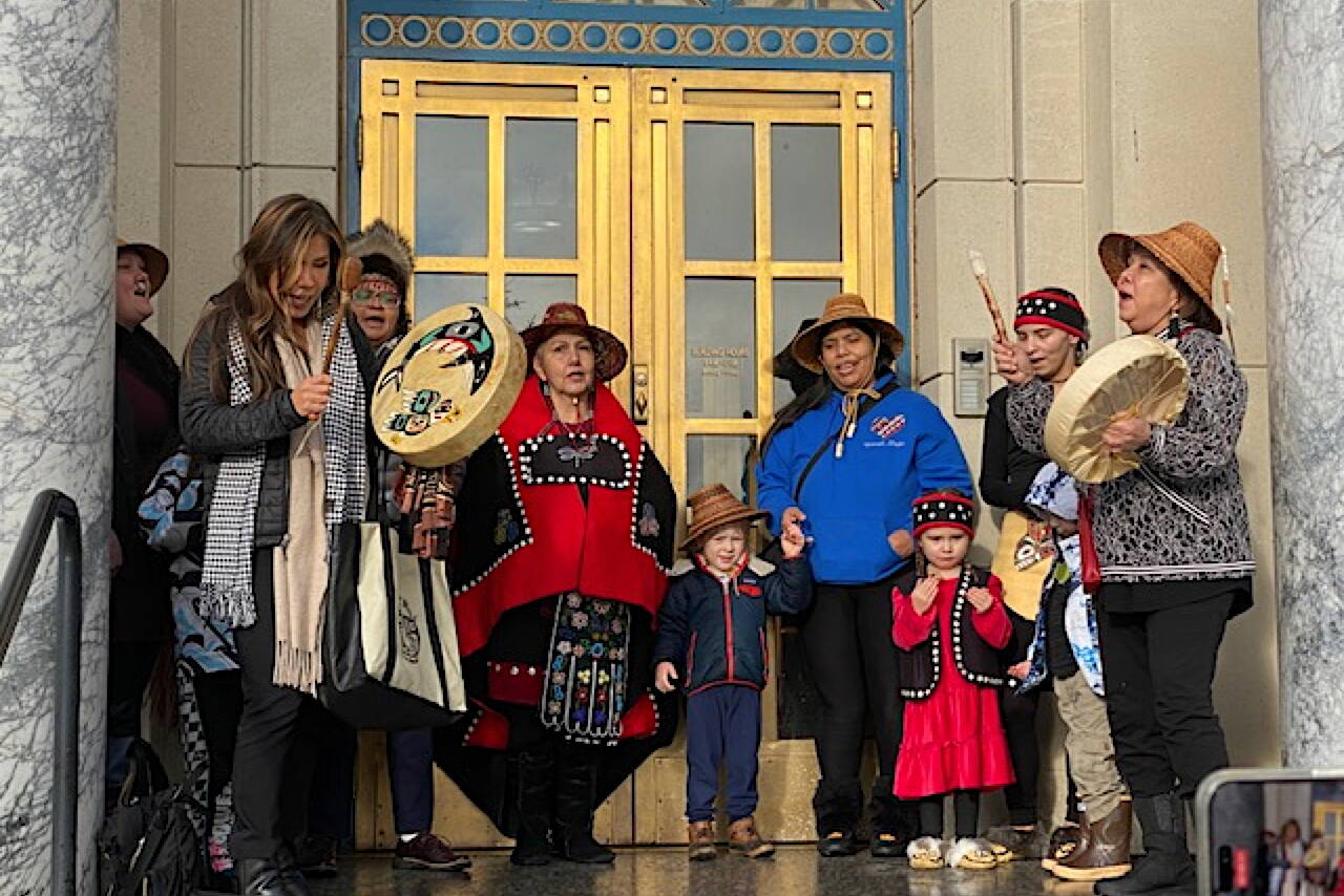 A dance group sings in a presentation by the Alaska Native Heritage Center and Native Movement at the state Capitol on Monday. (Photo by Claire Stremple/Alaska Beacon)