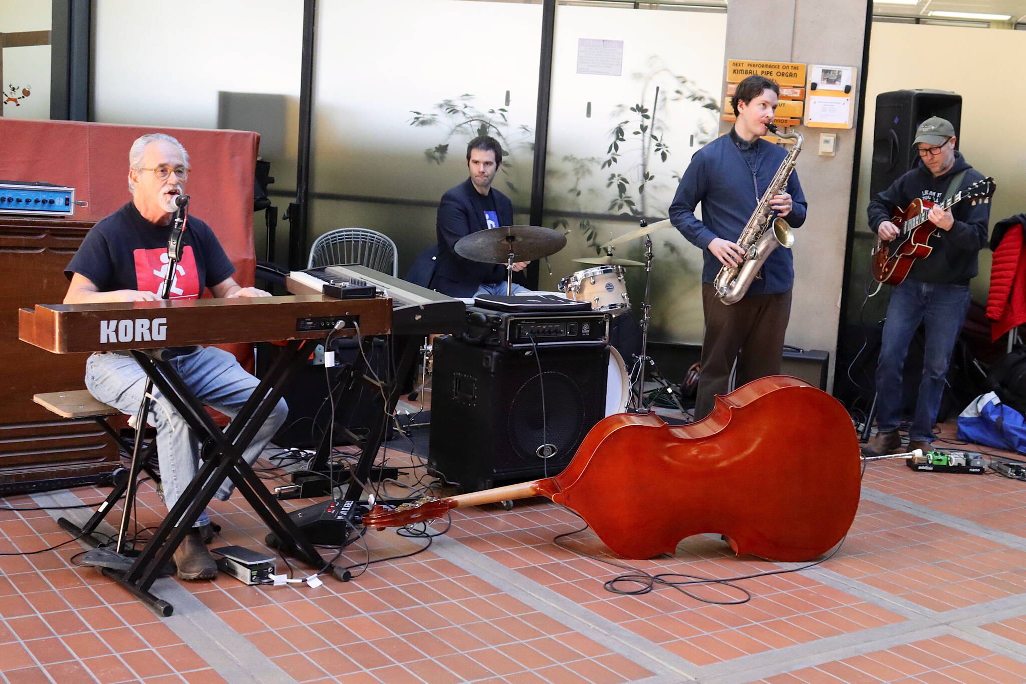 A small ensemble led by Bob Athayde, left, performs the first half of a free midday concert at the State Office Building on Thursday to open the first Juneau Jazz Festival. (Mark Sabbatini / Juneau Empire)