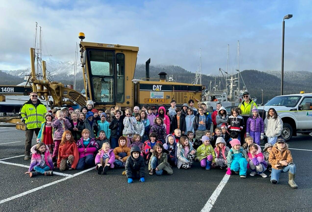 Local students visit Sir Plowsalot, one of the vehicles named by local youths in a city-sponsored contest. (City and Borough of Juneau photo)