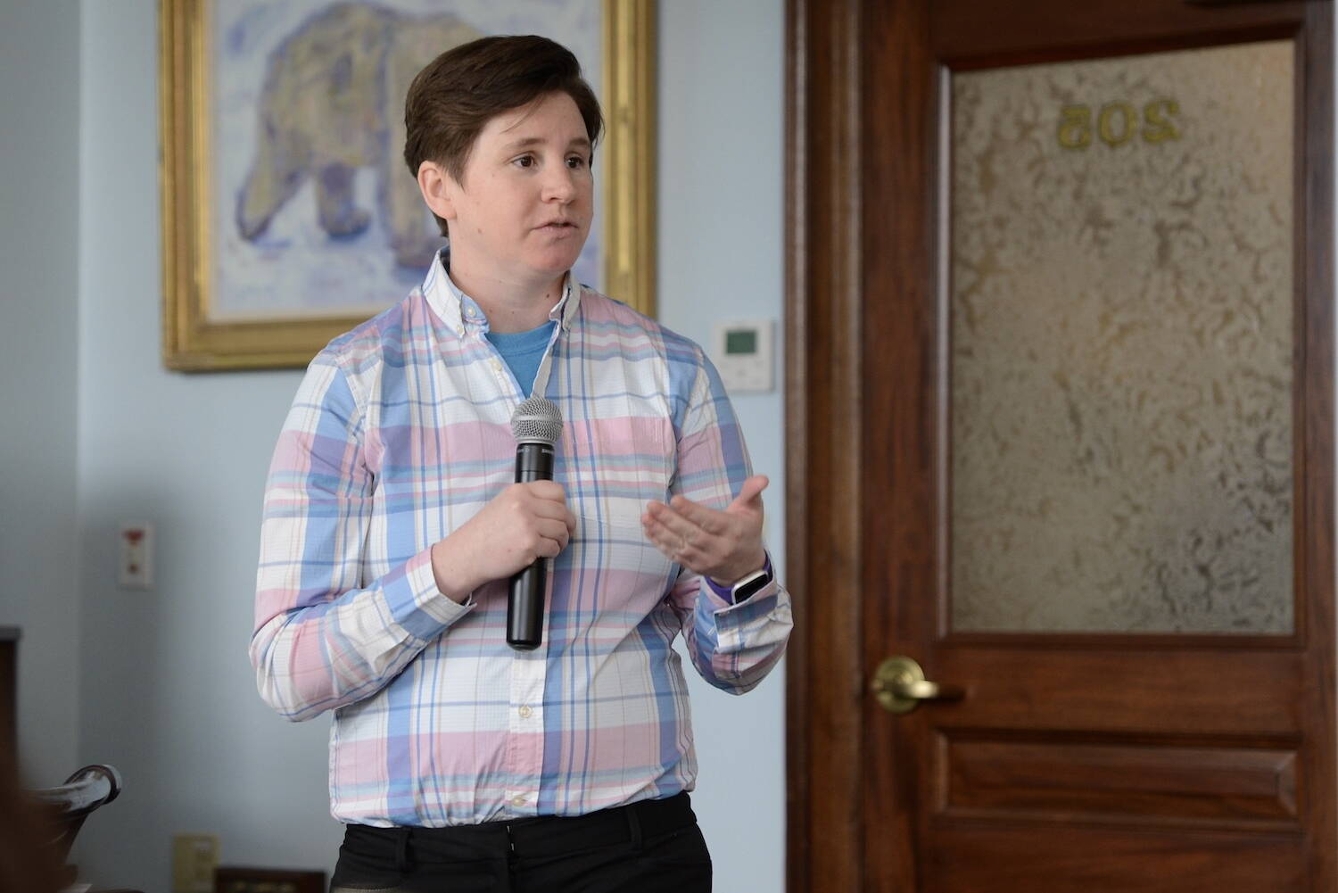 Issa Spatrisano, Alaska state refugee resettlement coordinator for Catholic Social Services, speaks Monday during a presentation to the Alaska Legislature. (James Brooks/Alaska Beacon)