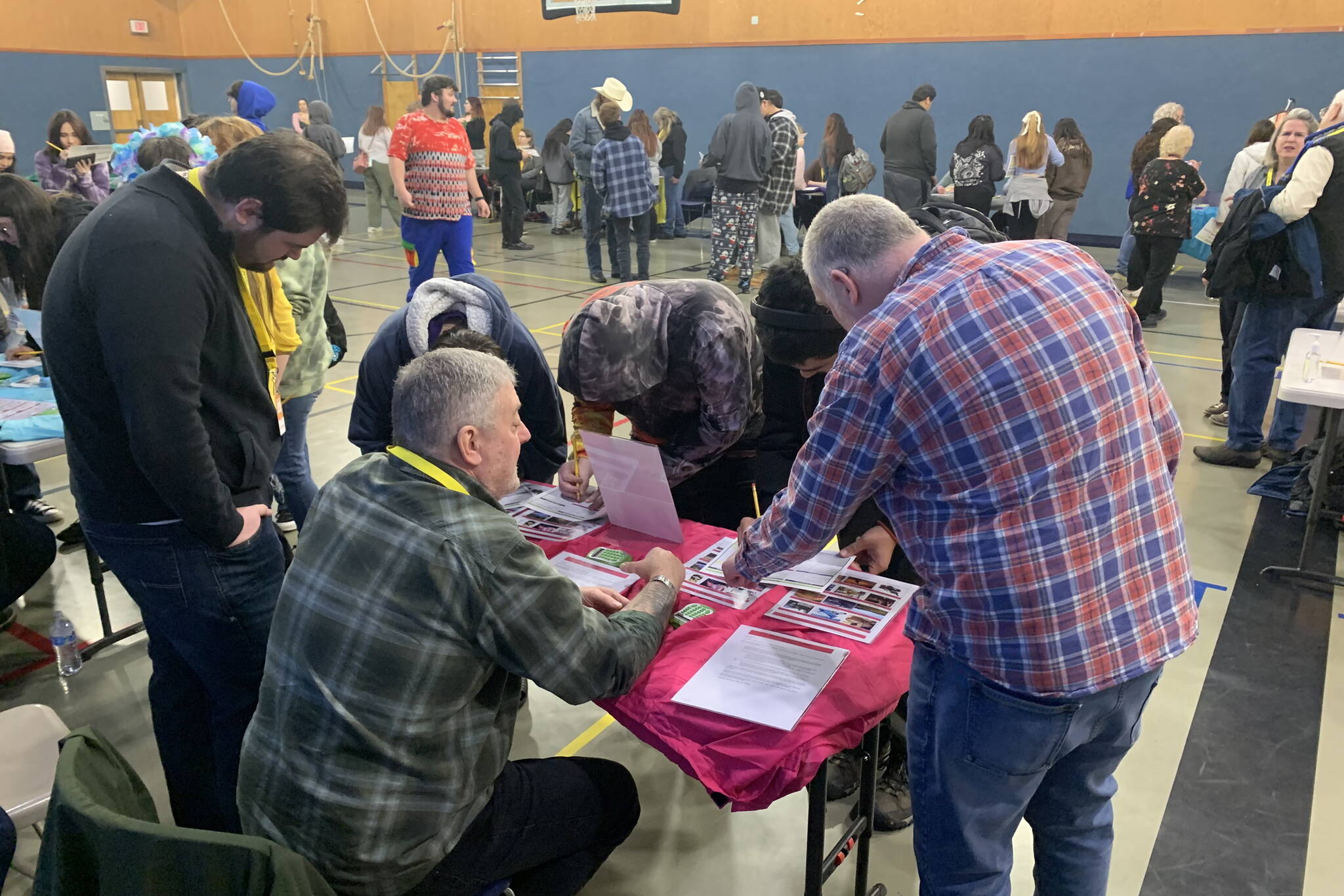 Students at Yaaḵoosgé Daakahídi High School participate in a Financial Reality Fair. (Photo courtesy of John Paul / Yaaḵoosgé Daakahídi High School)
