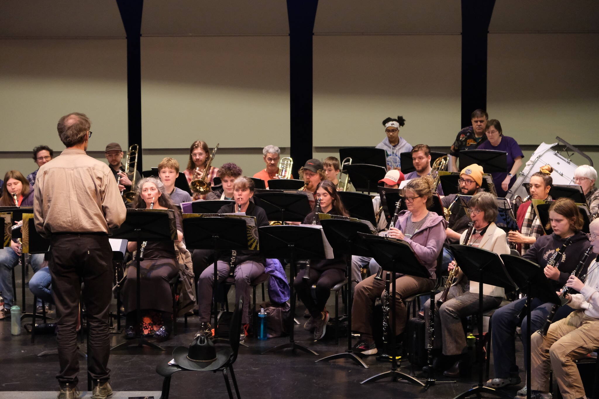Mike Bucy, Dzantik’i Heeni Middle School’s band teacher, conducts an ensemble of Taku Winds and DHMS band students during a rehearsal for a concert Saturday at Thunder Mountain High School. (Photo courtesy of Juneau Community Bands)