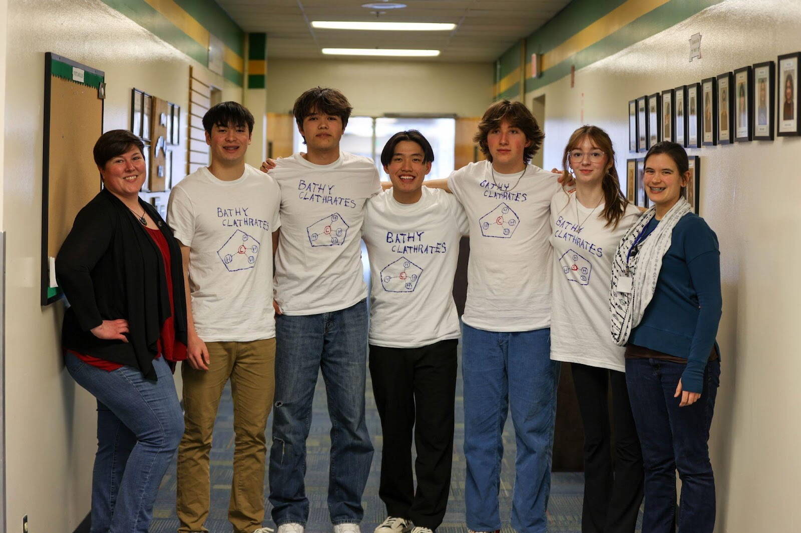 Pictured from left to right are Shannon Easterly, Sam Cheng, Alex Mallott, Edward Hu, Leif St. Clair, Peyton Edmunds and Shelby Nesheim. The five students in the middle are the Juneau-Douglas High School: Yadaa.at Kalé team that won the Tsunami Bowl in Seward on March 22-24. (Photo courtesy of National Ocean Sciences Bowl)