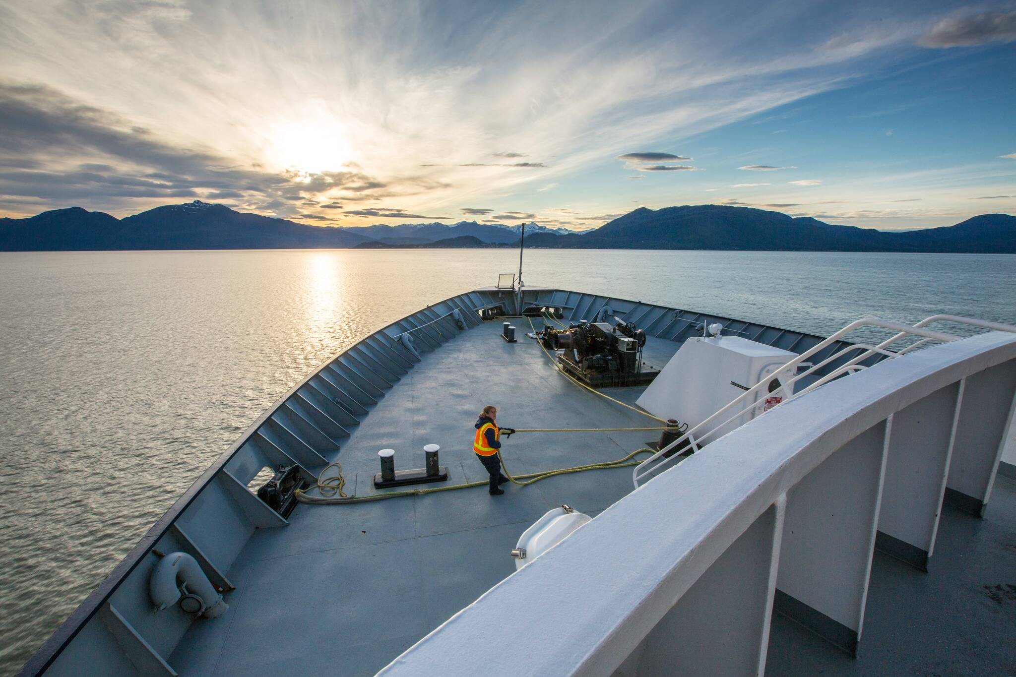 An employee works on the deck of an Alaska Marine Highway System vessel in a photo used by AMHS on social media to advertise jobs openings during the summer of 2023. (Alaska Department of Transportation and Public Facilities photo)