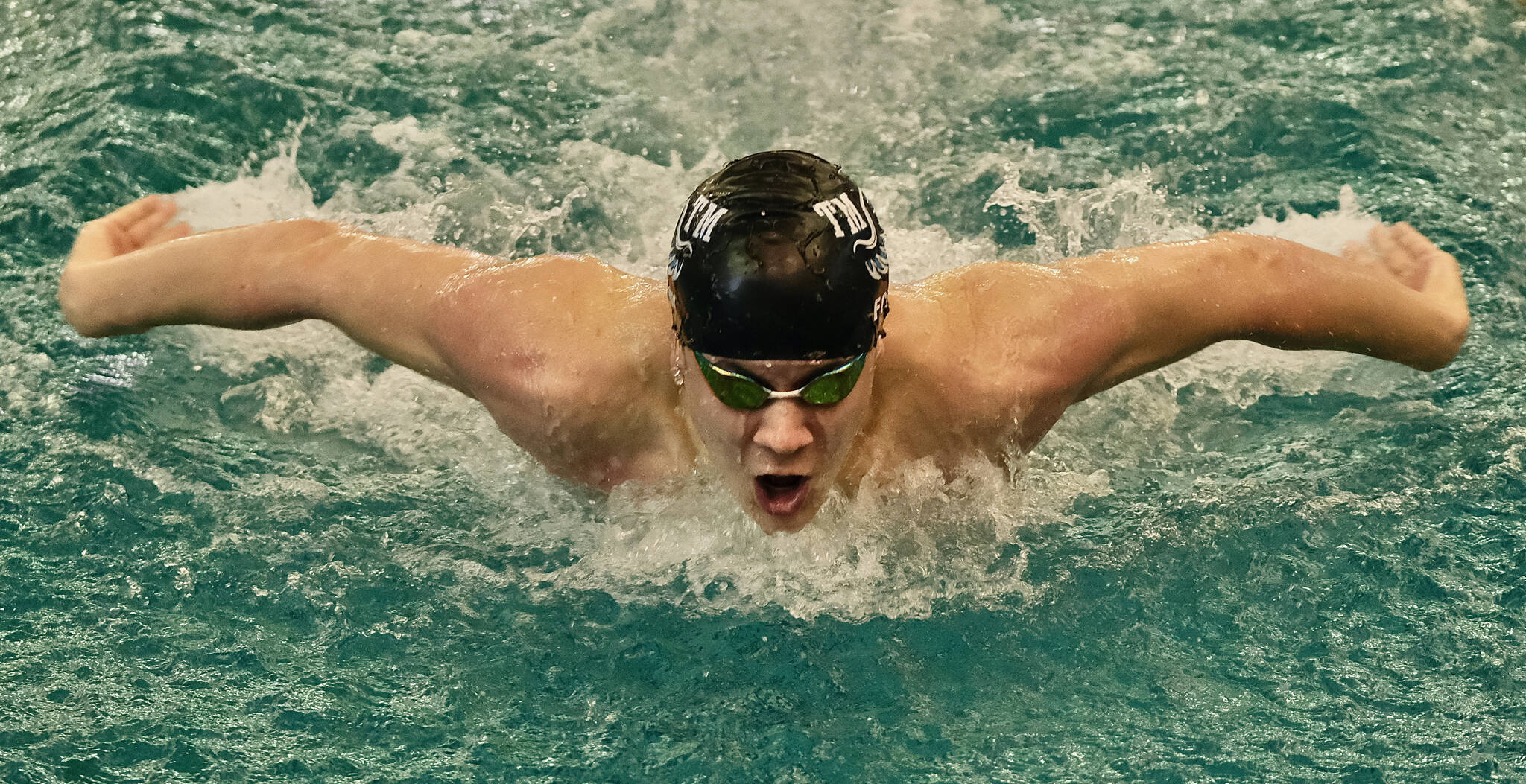 Juneau’s PJ Foy, shown winning the 2023 100 yard butterfly in 48.27 for Thunder Mountain High School during the ASAA state championships at the Dimond Park Aquatics Center on Nov. 4, 2023, qualified for the 2024 June Olympic Team Trials by swimming a 100 long course meters butterfly in a personal best 53.44 on March 16, 2024, at the Speedo Sectionals in Federal Way, Washington. (Klas Stolpe for the Juneau Empire)