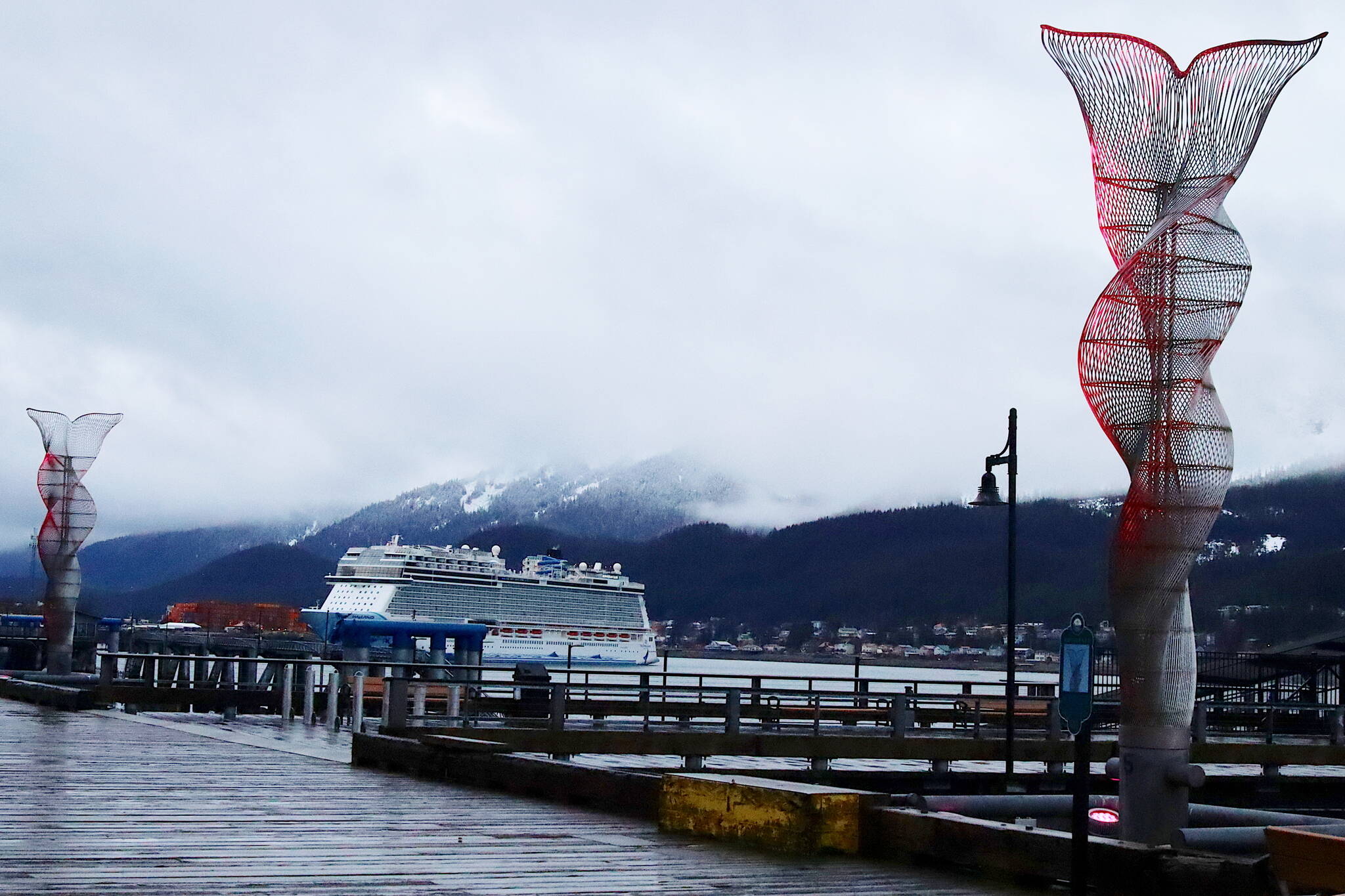 The 1,094-foot-long Norwegian Bliss docks in Juneau early Tuesday morning to begin this year’s cruise ship season. (Mark Sabbatini / Juneau Empire)