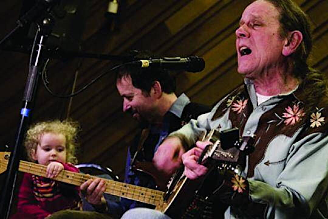 Buddy Tabor performs at Resurrection Lutheran Church in January 2009. Albert McDonnell and his daughter Hazel are shown at left. (Juneau Empire file photo)