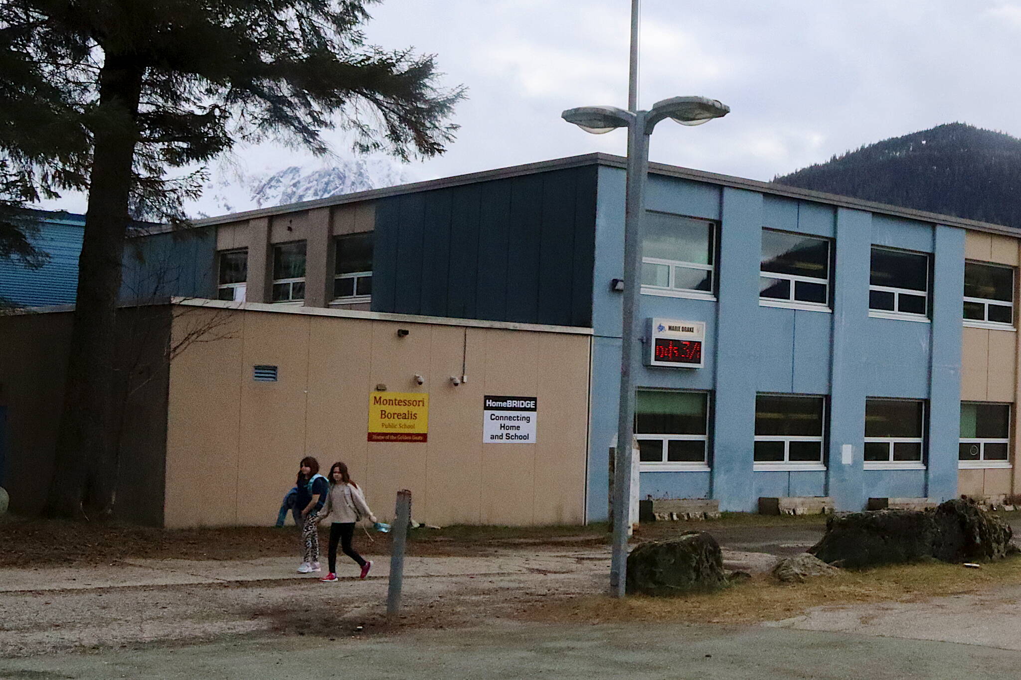 Students leave the Marie Drake Building, which houses local alternative education offerings including the HomeBRIDGE correspondence program, on April 4. (Mark Sabbatini / Juneau Empire file photo)