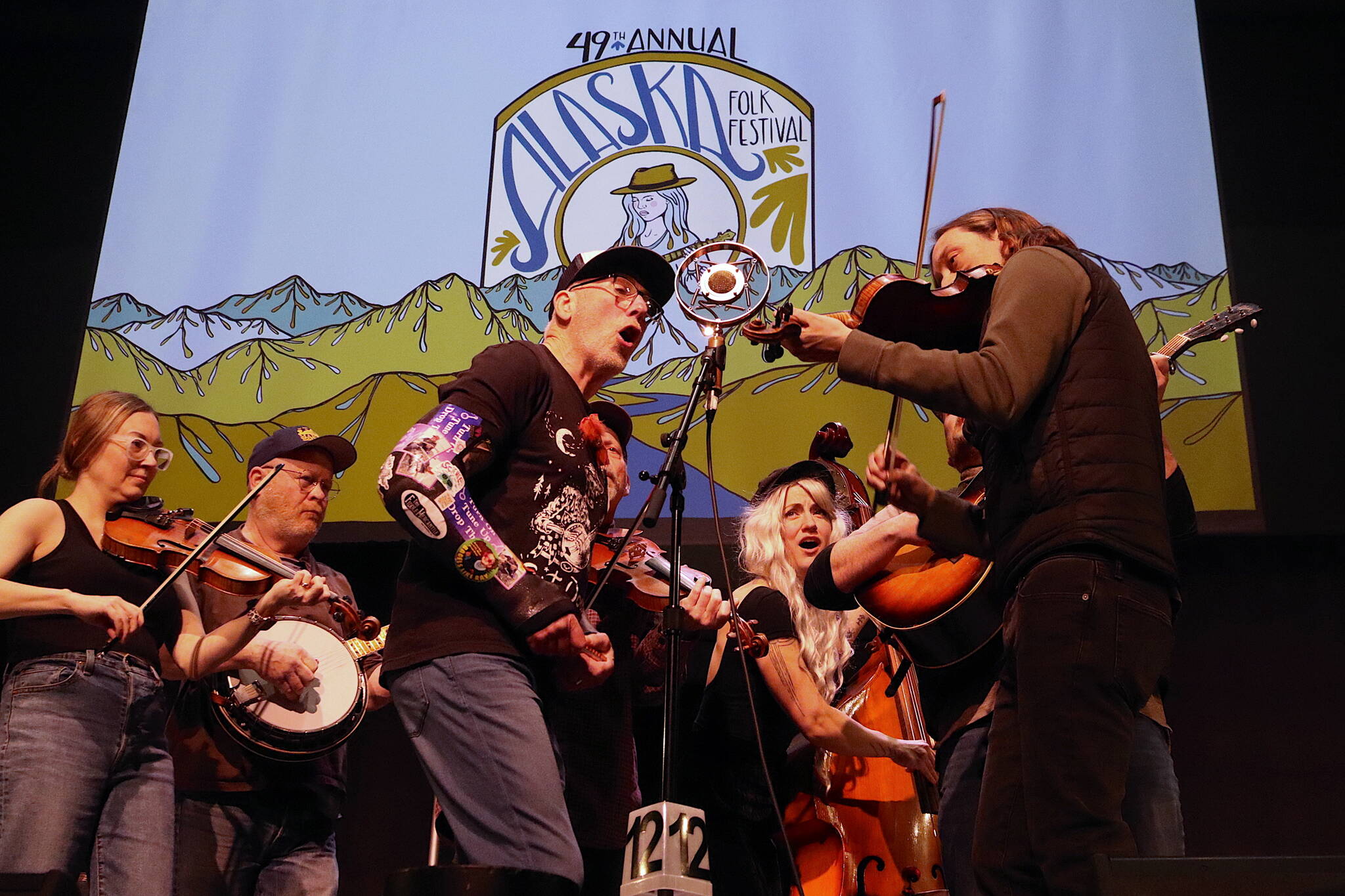 The Anchorage band Big Chimney Barn Dance performs in the main ballroom of Centennial Hall on Sunday night near the end of the 49th Annual Alaska Folk Festival. (Mark Sabbatini / Juneau Empire)