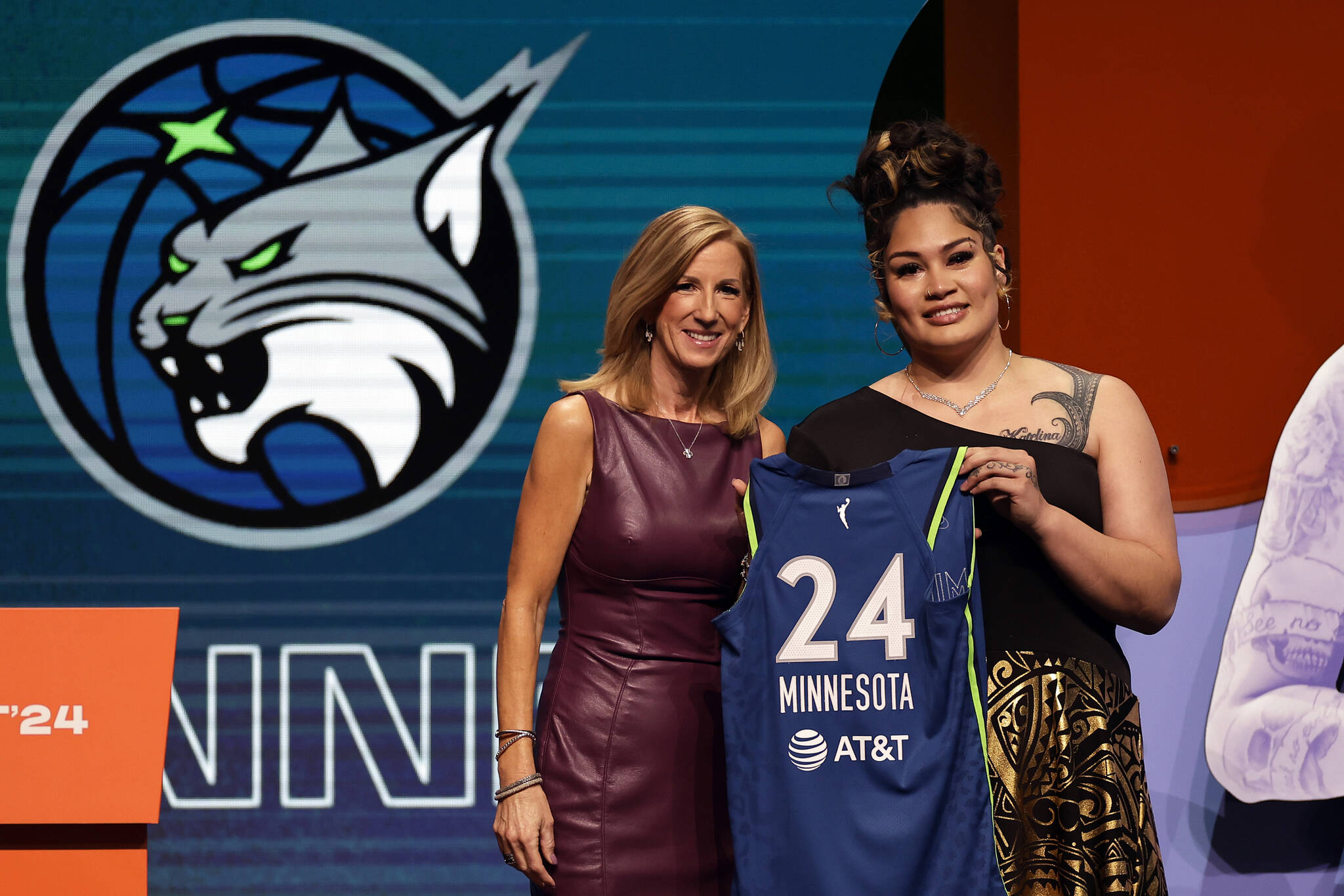 Utah’s Alissa Pili, right, poses for a photo with WNBA commissioner Cathy Engelbert after being selected eighth overall by the Minnesota Lynx during the first round of the WNBA basketball draft on Monday in New York. (AP Photo/Adam Hunger)