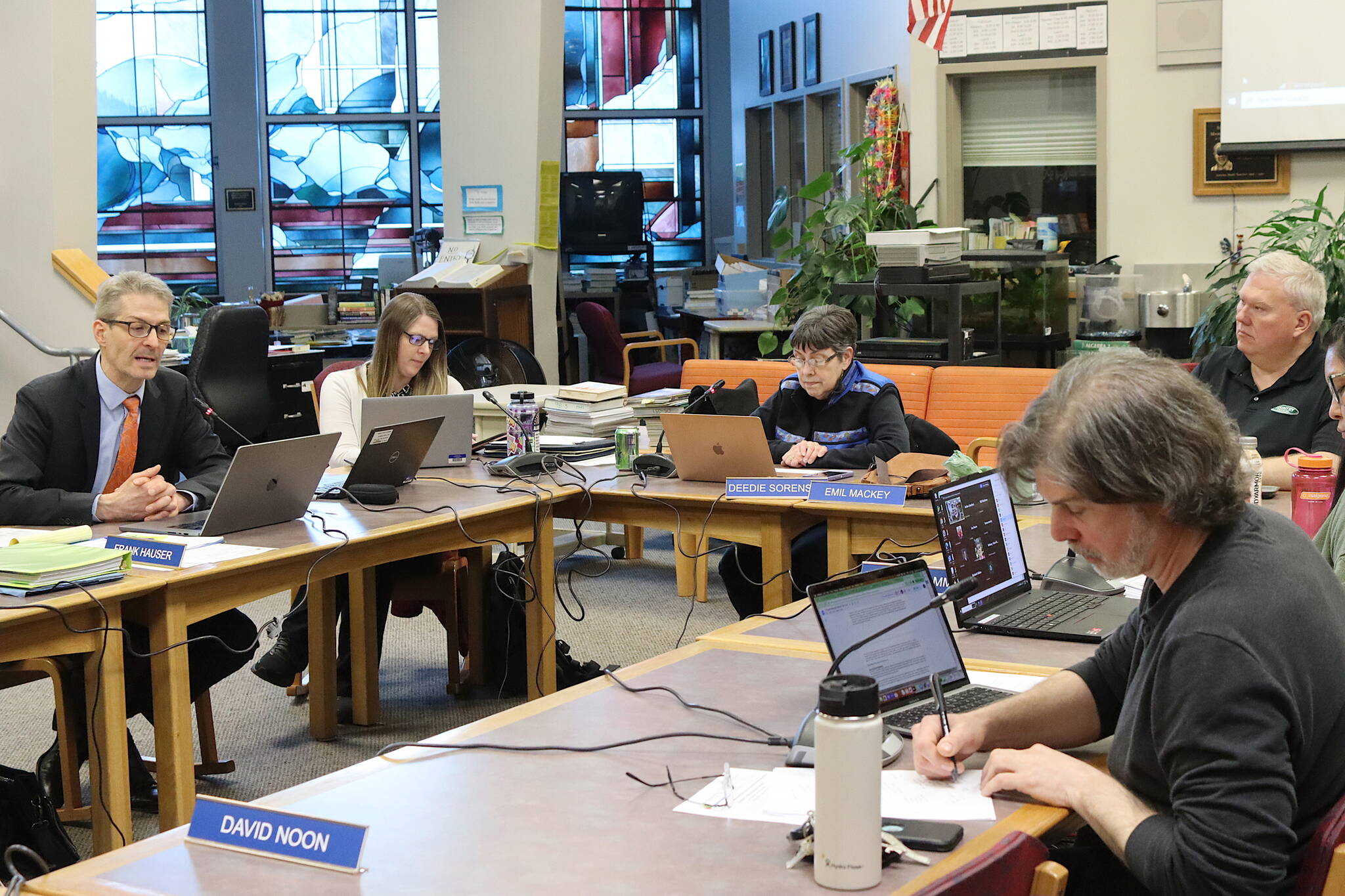 Juneau School District administrators and board members review the updated budget for the current fiscal year during a Board of Education meeting Tuesday night at Juneau-Douglas High School: Yadaa.at Kalé. (Mark Sabbatini / Juneau Empire)
