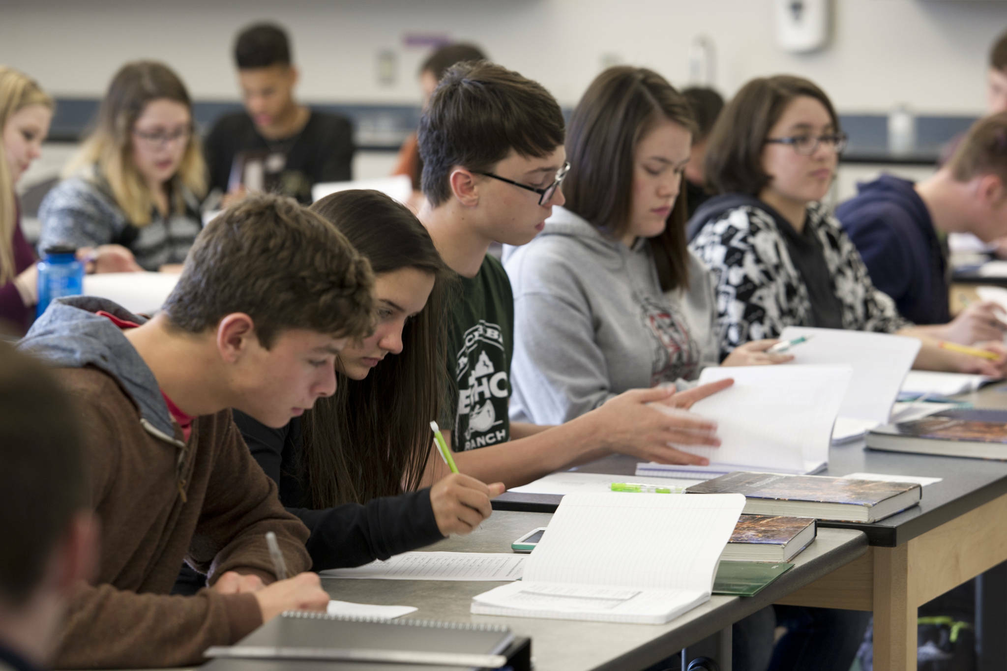 High school students in Juneau attend a chemistry class in 2016. (Michael Penn / Juneau Empire file photo)