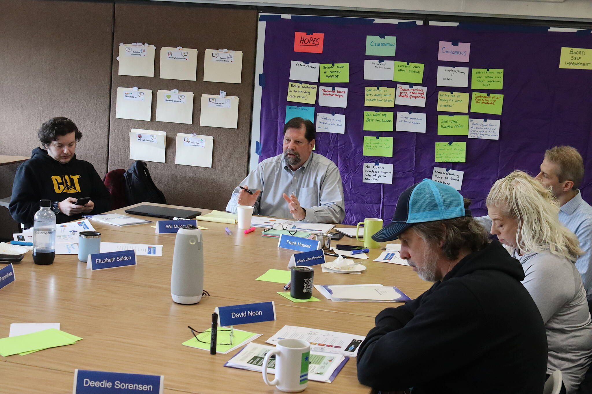 Lon Garrison (center), executive director of the Alaska Association of School Boards, presides over a Juneau Board of Education self-assessment retreat Saturday at Dzantik’i Heeni Middle School. (Mark Sabbatini / Juneau Empire)