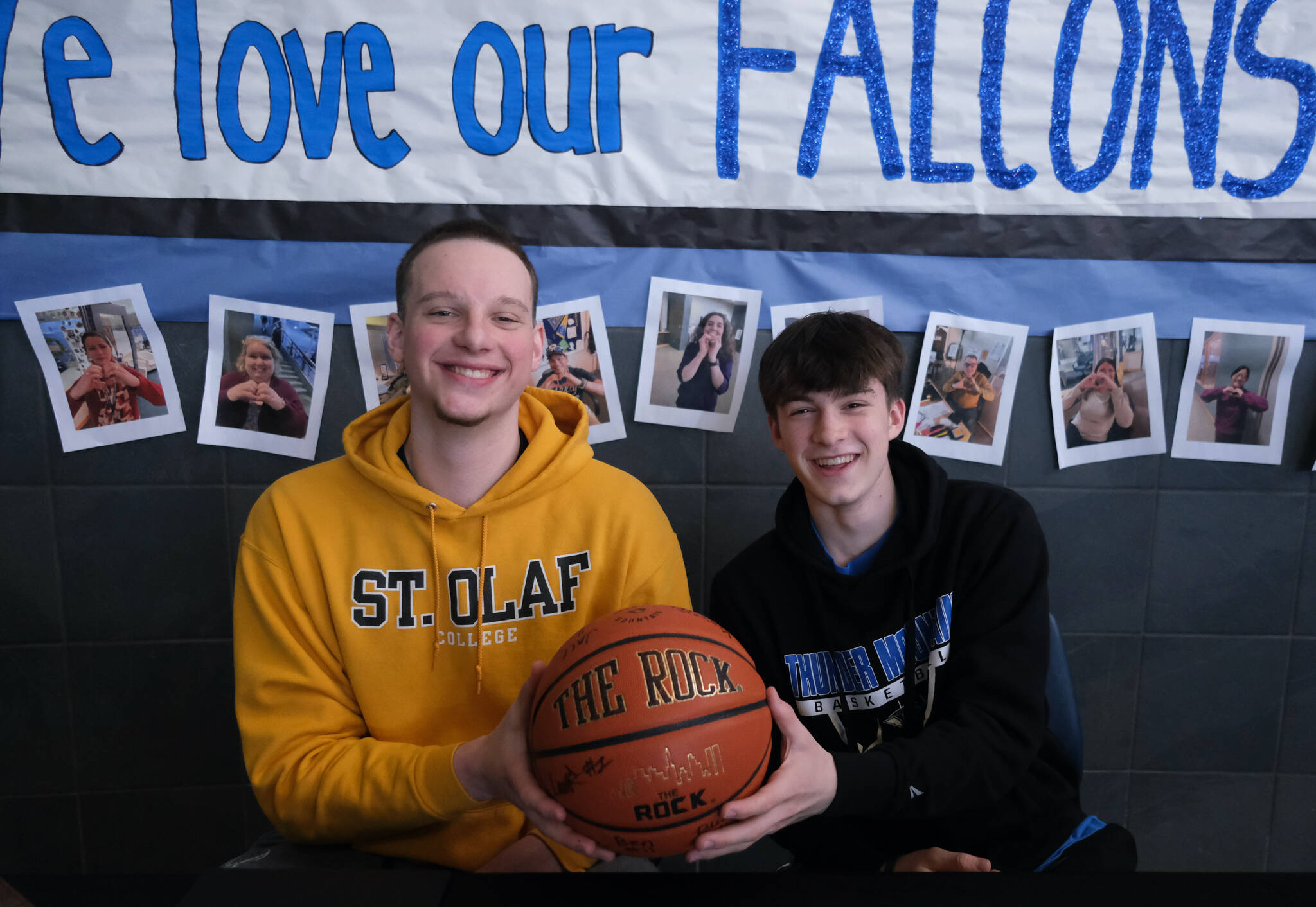 Thunder Mountain High School seniors James Polasky, left, and Samuel Lockhart, right, signed letters of intent on Thursday in the TMHS commons to play college basketball. Polasky will attend St. Olaf in Minnesota and Lockhart will attend Edmonds College in Washington state. (Klas Stolpe / For the Juneau Empire)