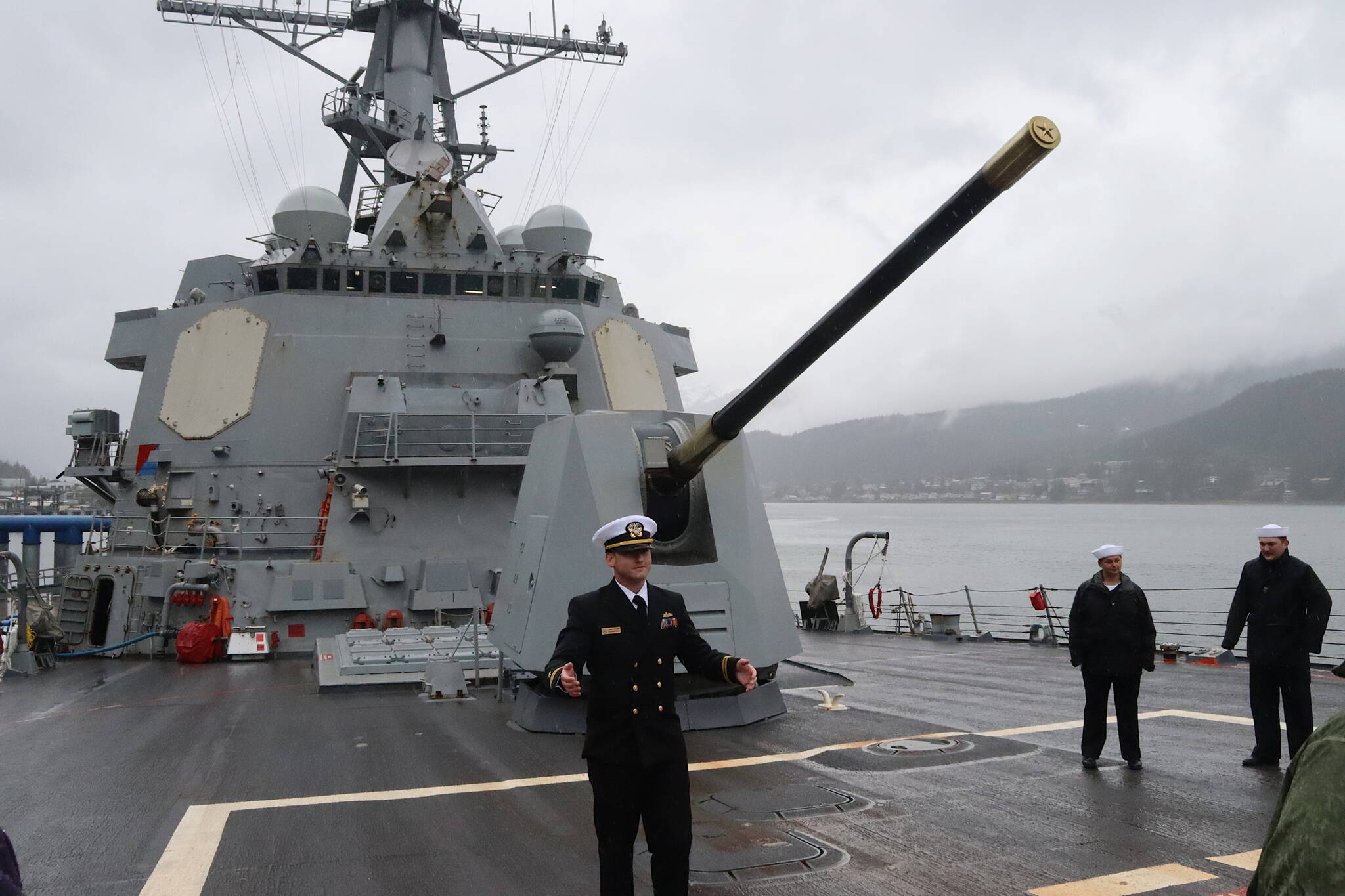 Lt. Daniel Schuerman, the ship’s operations officer, shows the 5-inch/54-caliber Mark 45 gun on the foredeck of the USS William P. Lawrence during a tour Sunday in Juneau. (Mark Sabbatini / Juneau Empire)