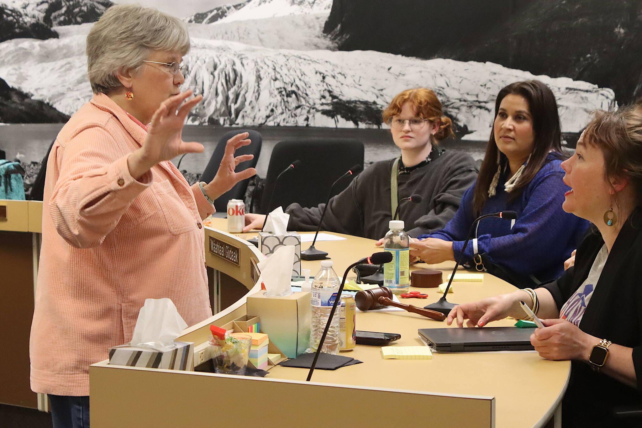 Deputy Mayor Michelle Bonnet Hale (left) talks with Assembly members (from right to left) Alicia Hughes-Skandijs, Wáahlaal Gíidaak Barbara Blake and Ella Adkison following an Assembly Finance Committee meeting Wednesday night. Hale and Blake, whose terms expire this fall, say they are not seeking reelection. (Mark Sabbatini / Juneau Empire)