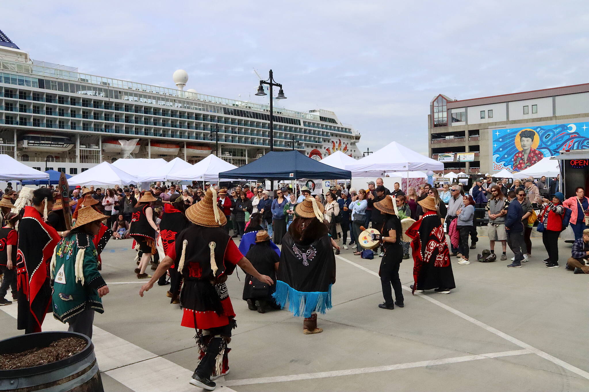 Alaska Native dancers perform during the Maritime Festival on May 4 at Elizabeth Peratrovich Plaza, located in an area between the Marine Parking Garage and Taku Dock formerly known as the Archipelago Property. Among the projects proposed using Marine Passenger Fees is an Archipelago Museum in the undeveloped space that was originally proposed several years ago. (Mark Sabbatini / Juneau Empire)