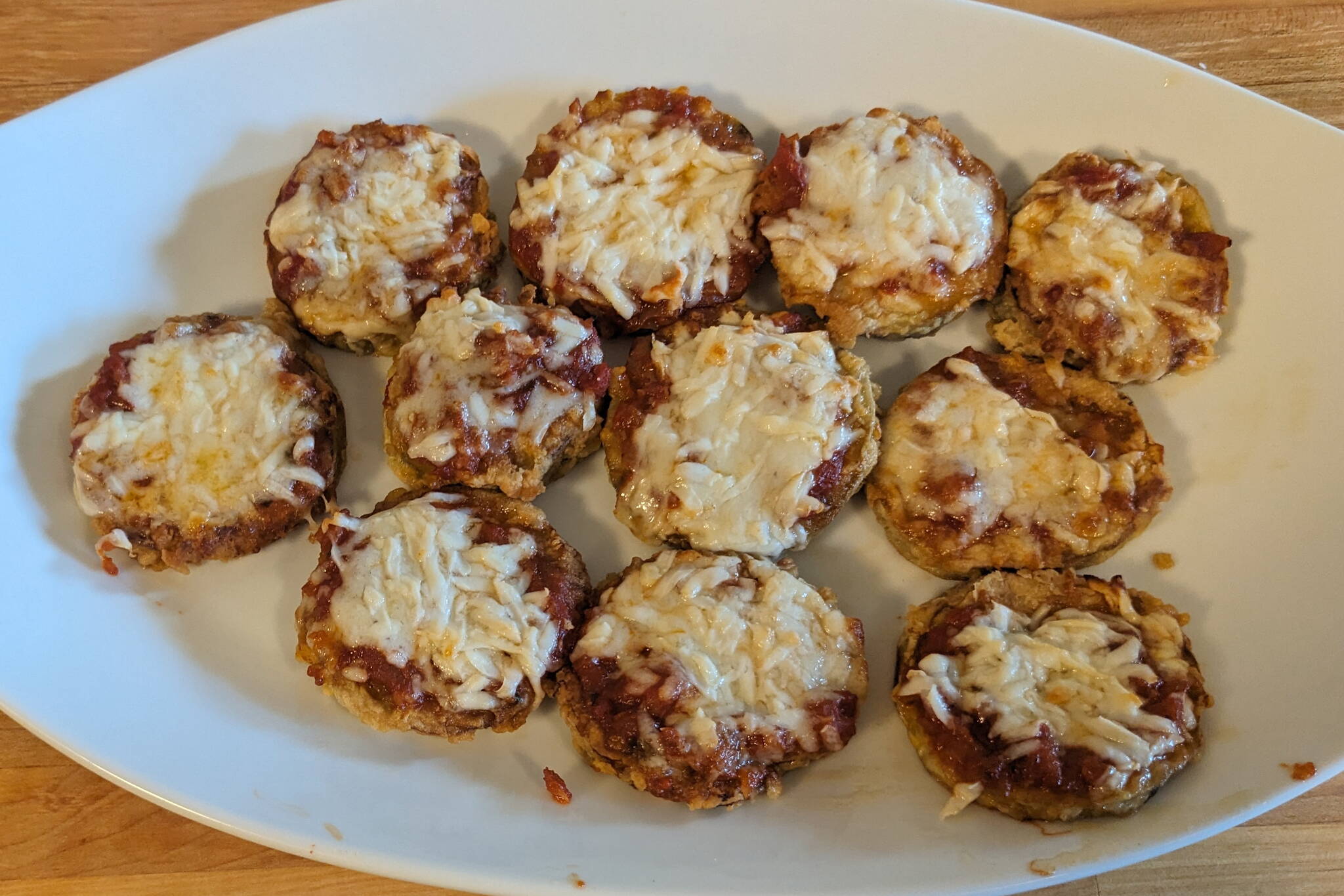 Individual eggplant parmesan rounds ready to serve. (Photo by Patty Schied)
