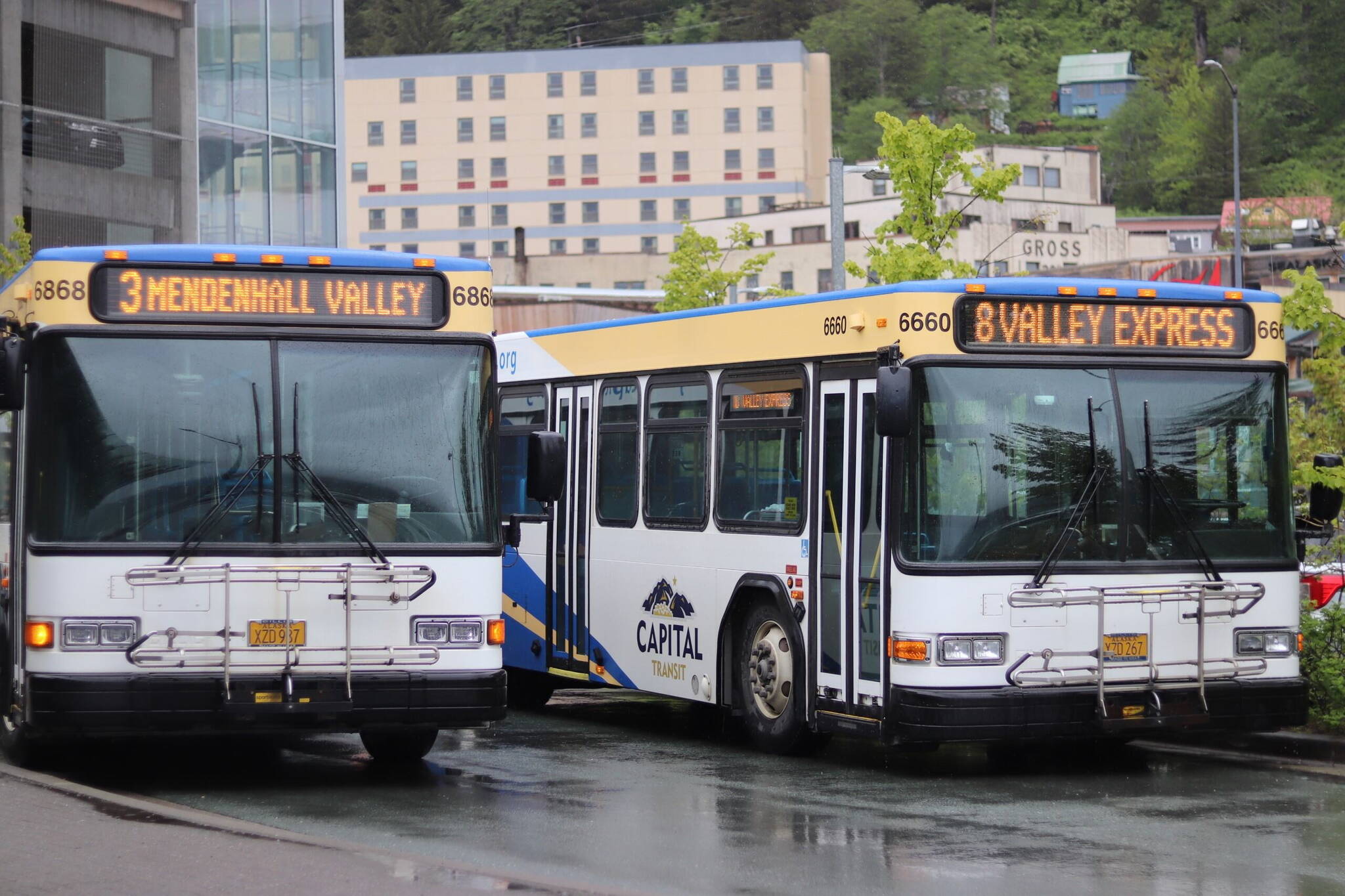 Capital Transit buses wait to depart from the downtown transit center on Thursday. Route number 8 was adjusted this spring. (Jasz Garrett / Juneau Empire)