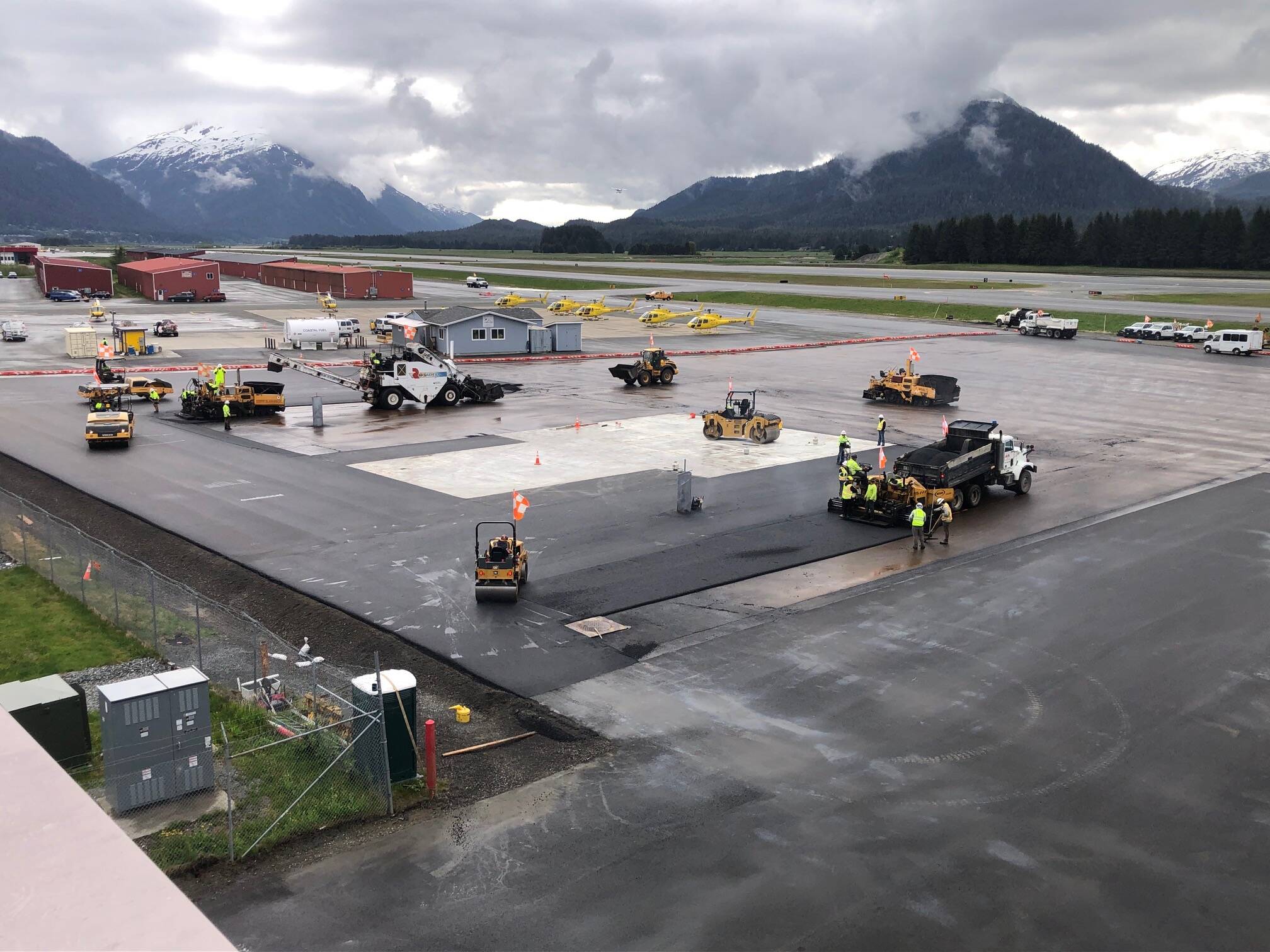 A photo taken from the terminal roof shows the extent of the first phase of paving to accommodate large aircraft. (Mike Greene / City and Borough of Juneau)