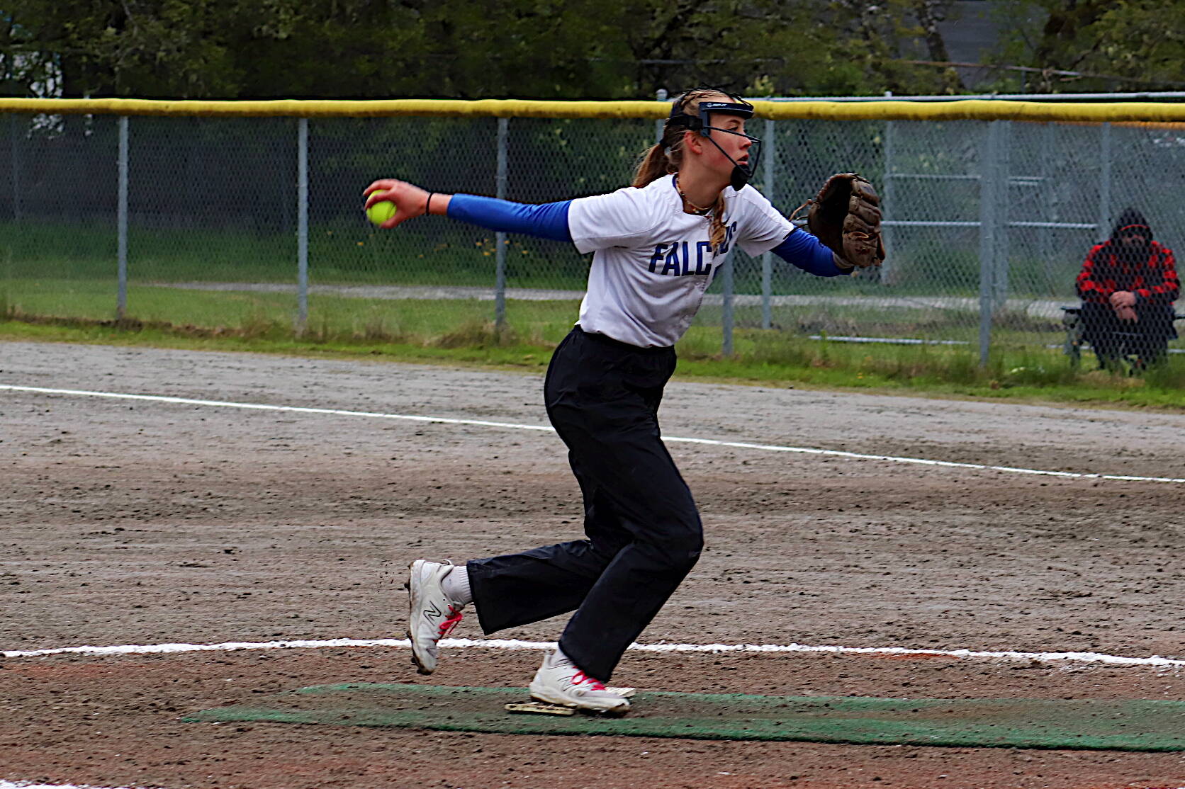 Thunder Mountain High School’s Ashlyn Gates, seen here pitching against Sitka High School during the Region V softball conference tournament last Saturday in Juneau, was named player of the game in an 8-0 win over Delta Junction High School to open the state softball title tournament on Thursday in Fairbanks. (Jasz Garrett / Juneau Empire file photo)