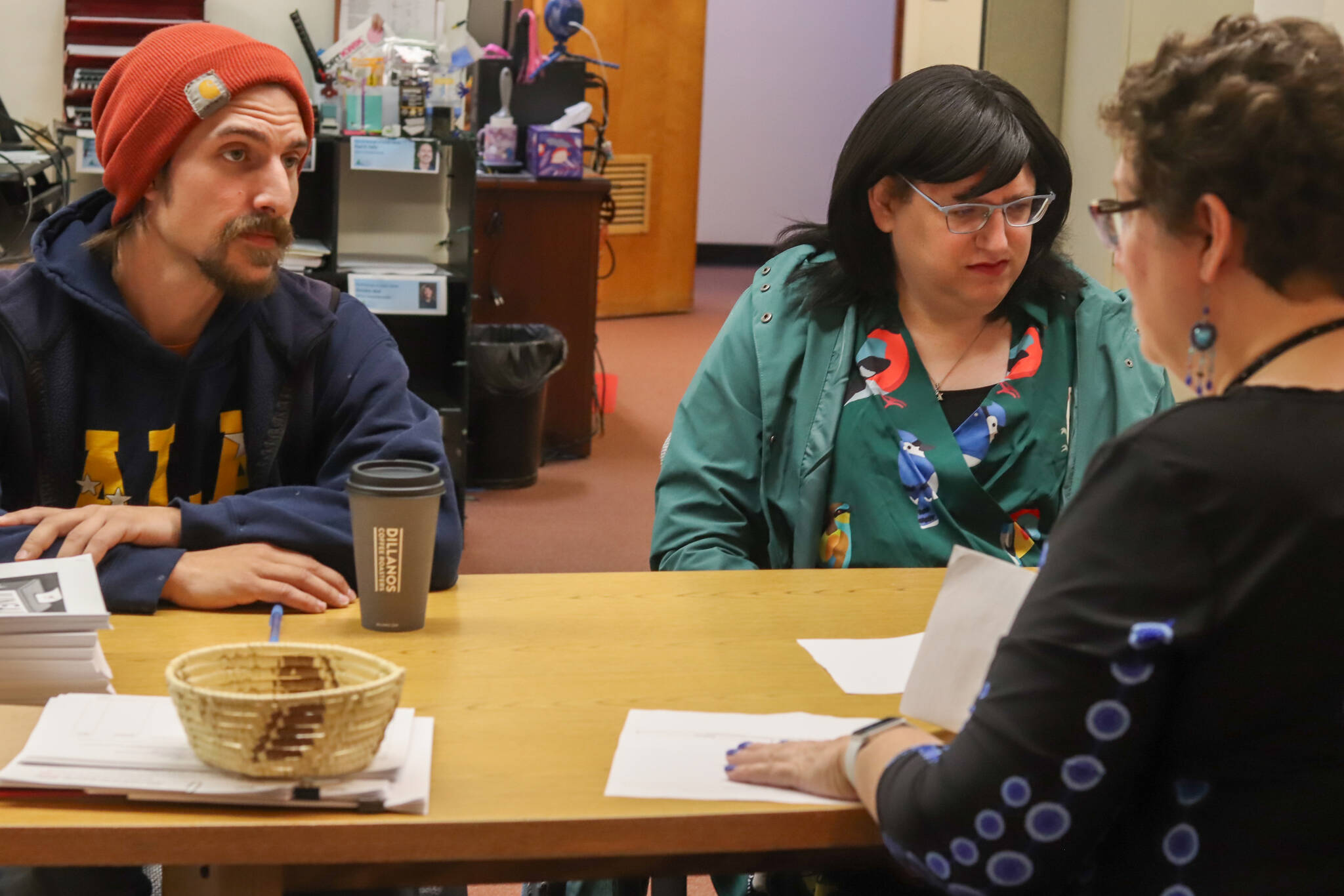 Nano Brooks and Emily Mesch file for candidacy on Friday at the City and Borough of Juneau Municipal Clerks office in City Hall. (Jasz Garrett / Juneau Empire)