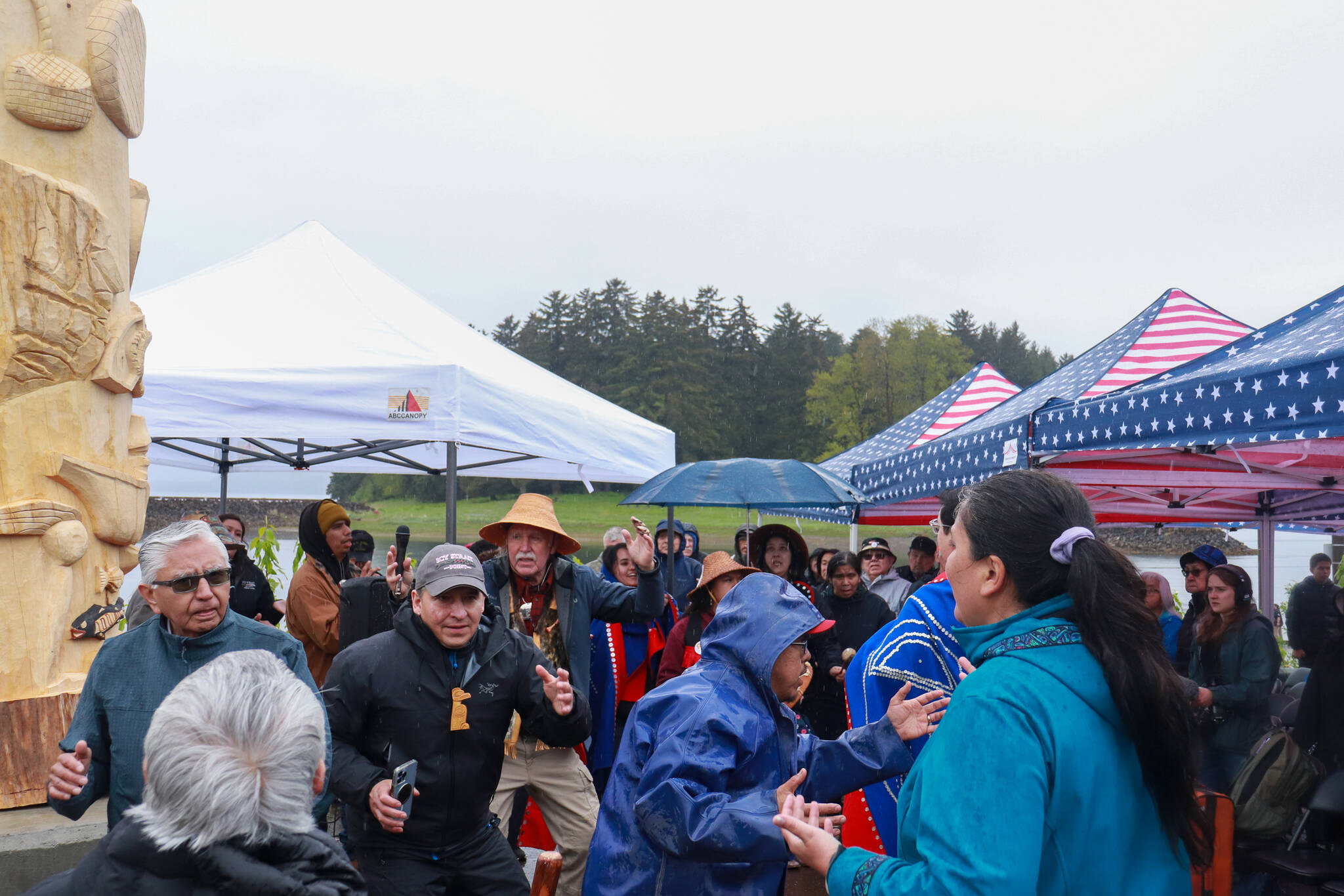People dance in celebration of the Fishermen’s Totem Pole in Hoonah on Friday, May 30, 2025. (Jasz Garrett / Juneau Empire)