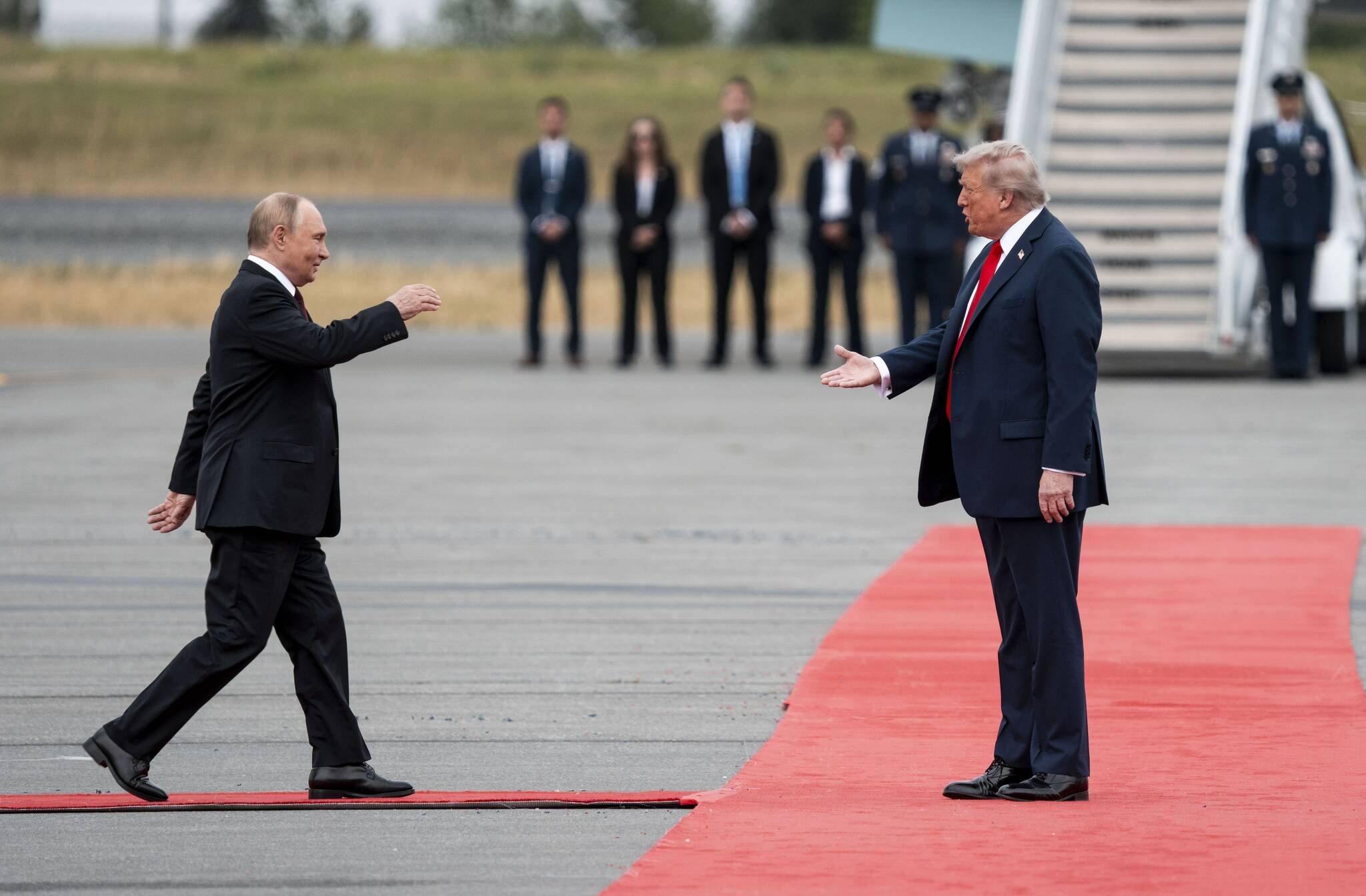 President Donald Trump greets President Vladimir Putin of Russia as they met at Joint Base Elmendorf-Richardson in Anchorage, Alaska, on Friday, Aug. 15, 2025. (Doug Mills/The New York Times)