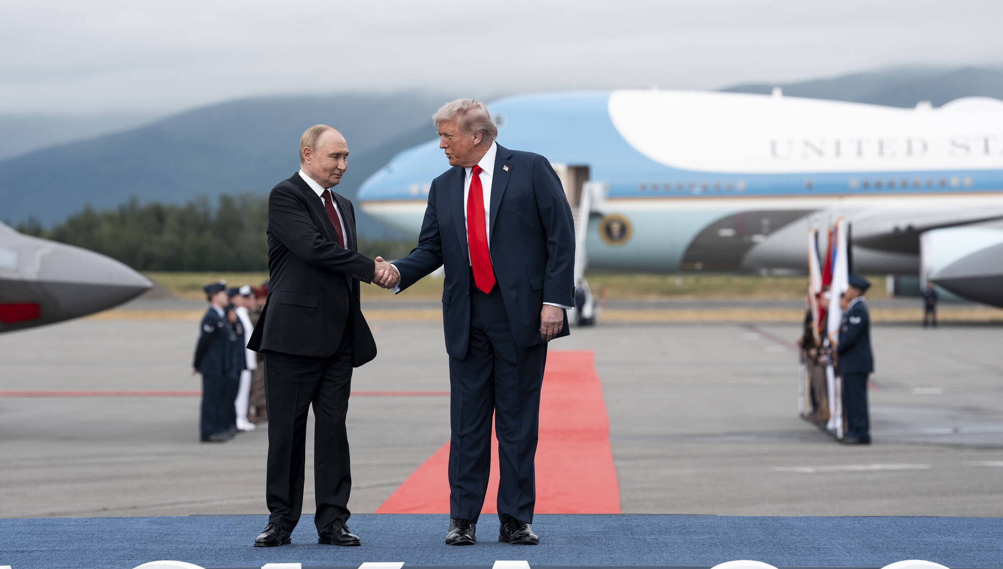 President Donald Trump greets President Vladimir Putin of Russia as they met at Joint Base Elmendorf-Richardson in Anchorage, Alaska, on Friday, Aug. 15, 2025. (Doug Mills/The New York Times)