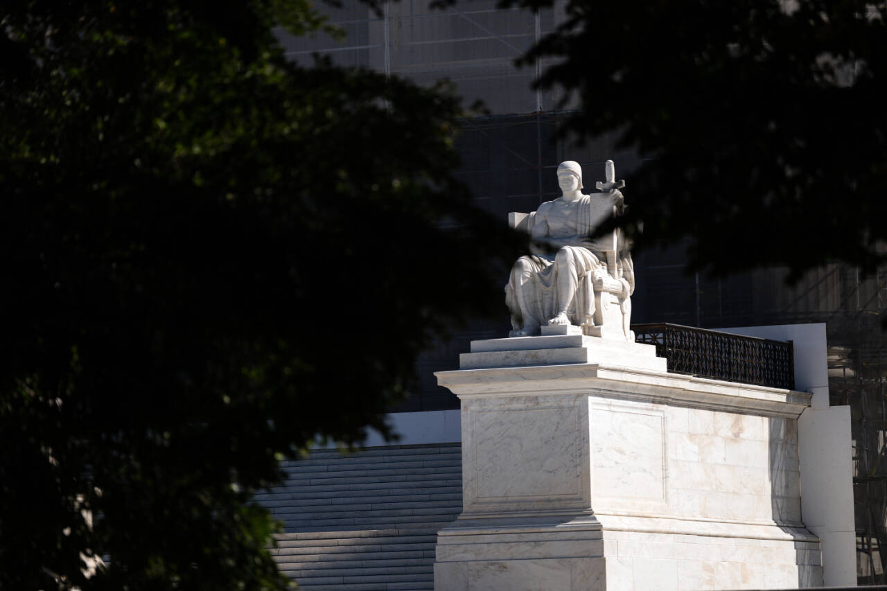 File photo, Tierney L. Cross/The New York Times
The marble statue depicting “The Authority of Law” is visible outside the Supreme Court in Washington on Monday, Oct. 6, 2025.