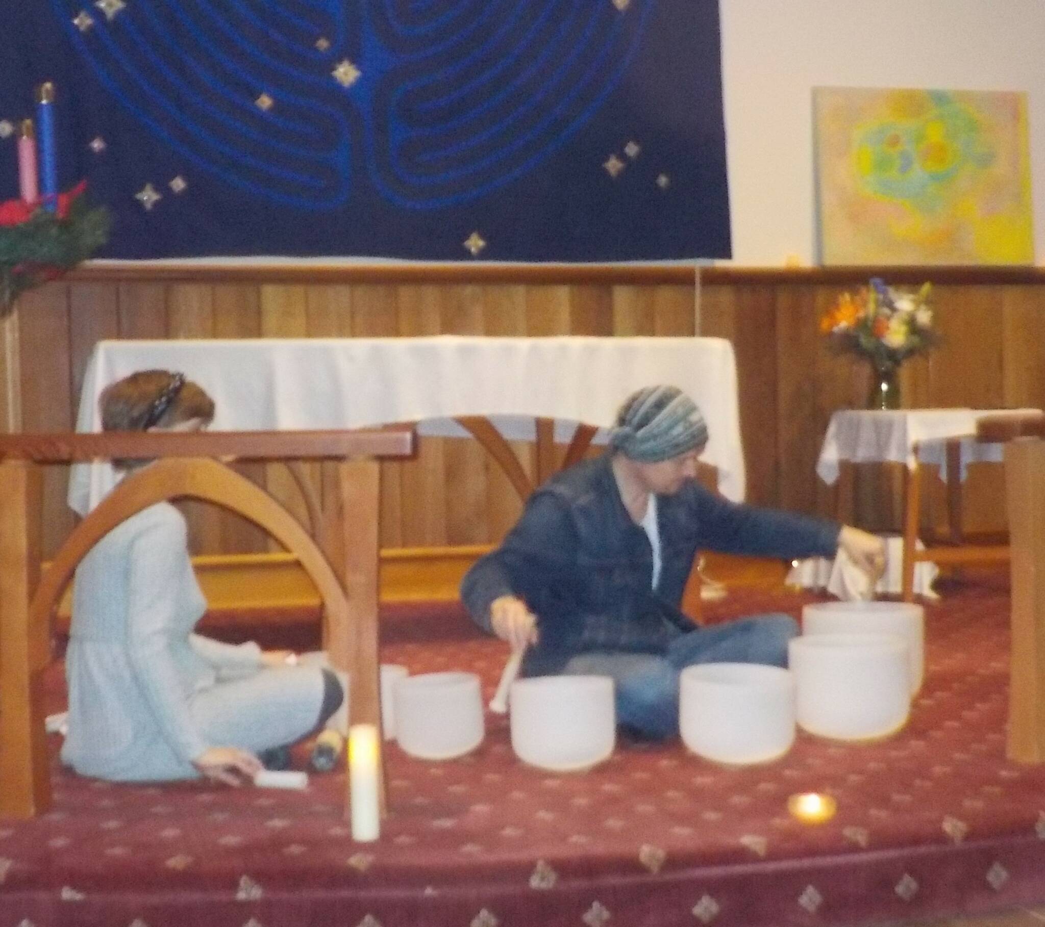 photo by Page Bridges
Heather Mountcastle and Luke Weld playing crystal singing bowls at Holy Trinity Church.