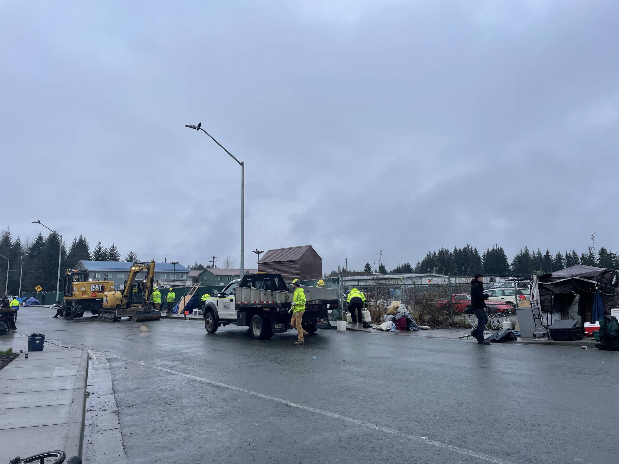 City employees clear the unhoused encampment on Teal Street on Friday, Nov. 14, 2025. (Mari Kanagy / Juneau Empire)