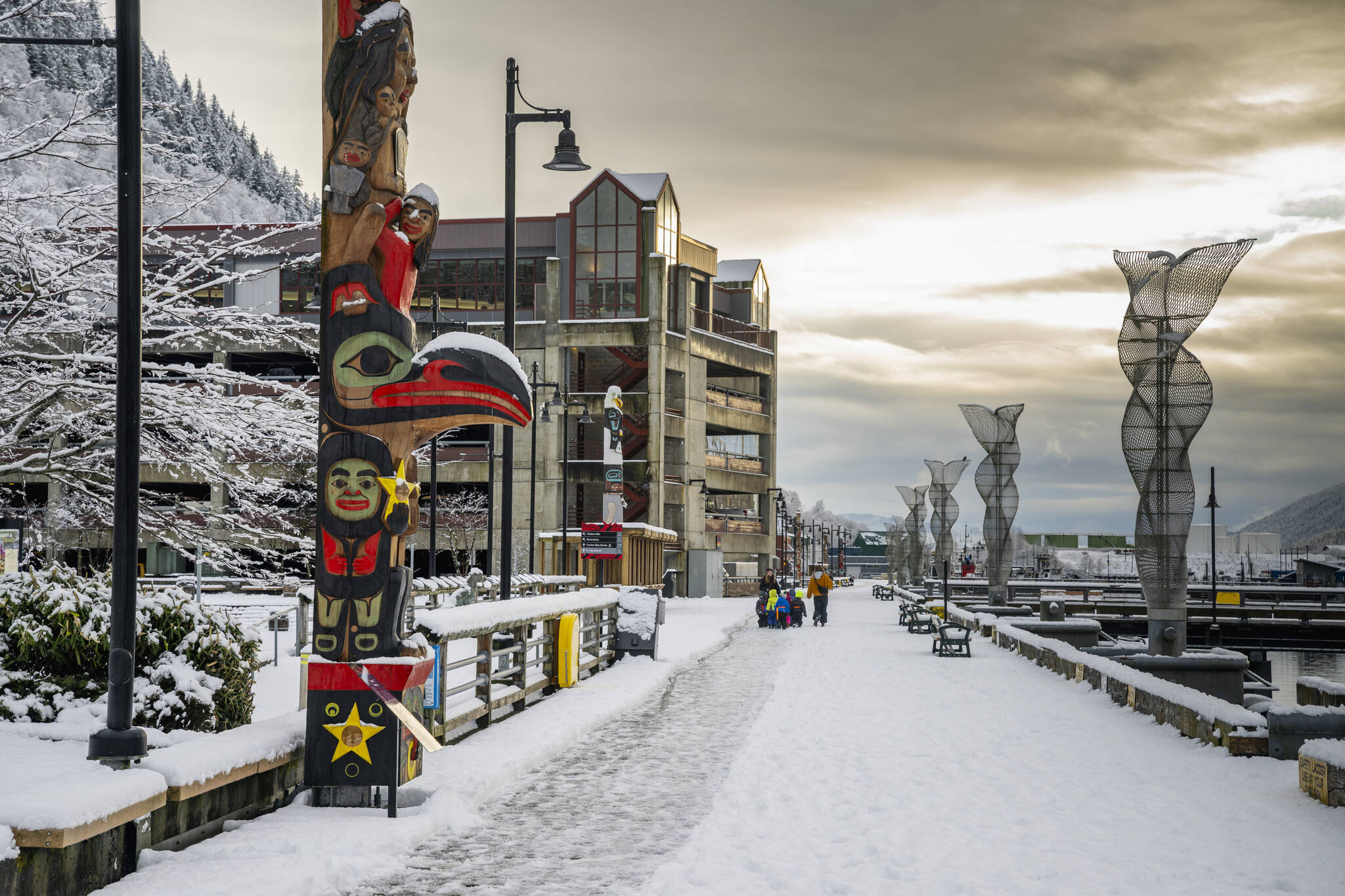 A totem pole, one of 13 on downtown’s Totem Pole Trail in Juneau, Alaska, Nov. 27, 2024. (Christopher S. Miller/The New York Times)