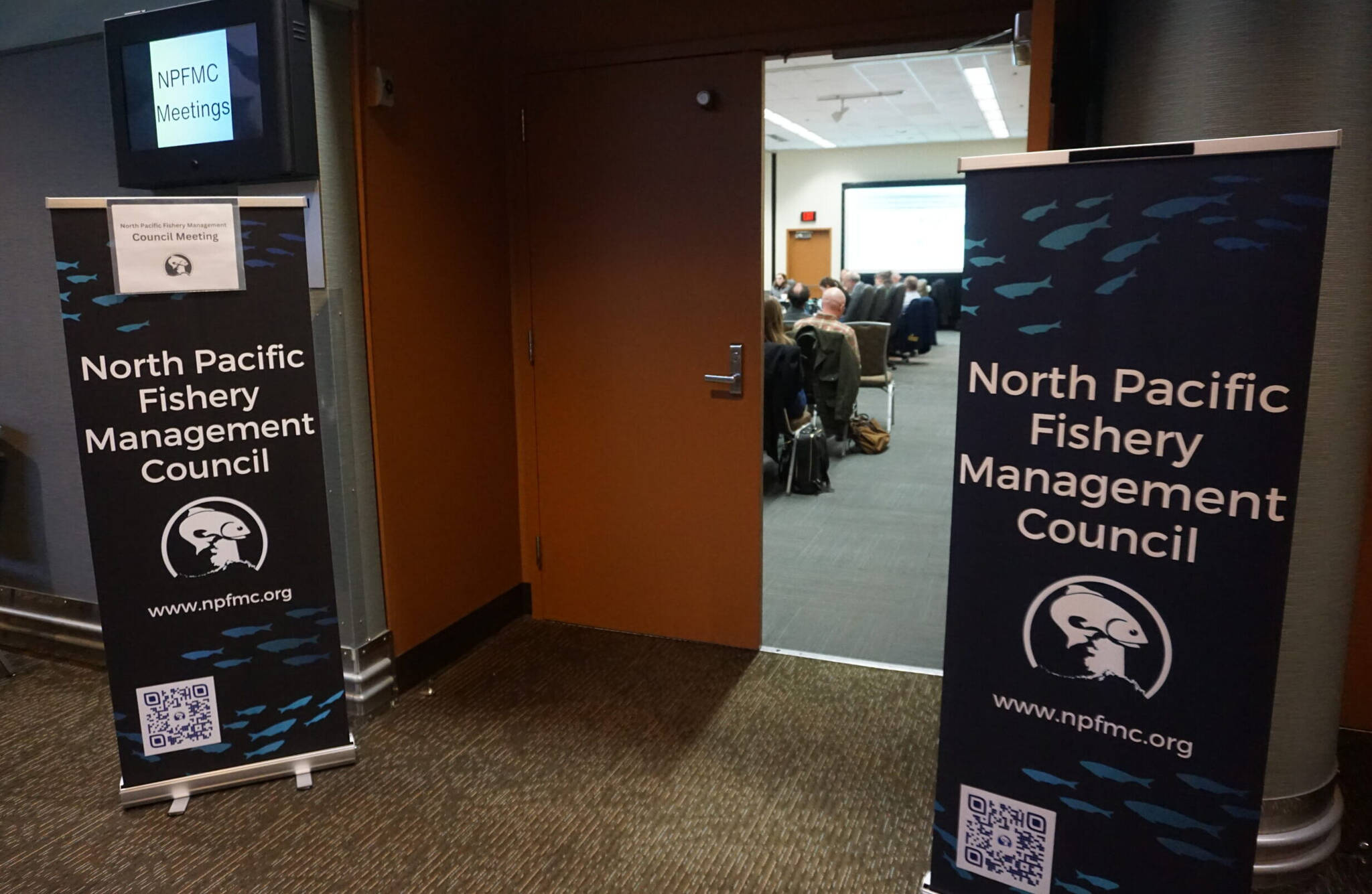 The North Pacific Fishery Management Council’s December meeting, held at the William A. Egan Civic and Convention Center in Anchorage, is seen underway on Dec. 6, 2025. (Photo by Yereth Rosen/Alaska Beacon)