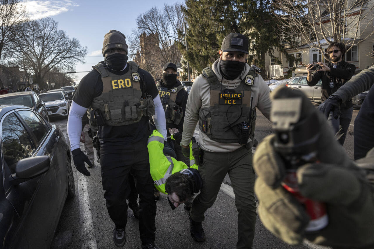 David Guttenfelder/The New York Times
FILE  Federal agents arrest a protester during an active immigration enforcement operation in a Minneapolis neighborhood, Jan. 13, 2026. The chief federal judge in Minnesota excoriated Immigration and Customs Enforcement on Wednesday, Jan. 28, saying it had violated nearly 100 court orders stemming from its aggressive crackdown in the state and had disobeyed more judicial directives in January alone than some federal agencies have violated in their entire existence.