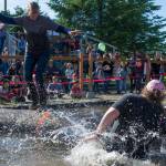 Veronica Friend, left, out duels Alea Oien in the log rolling contest at the 27th Annual Gold Rush Days Competition at Savikko Park on Sunday, June 18, 2017. (Michael Penn | Juneau Empire File)