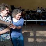Dr. Alex Malter dances with Dr. Marna Schwartz to the music of the Thunder Mountain Big Band during the Block Party at the Juneau Arts & Culture Center on Friday, June 15, 2018. (Michael Penn | Juneau Empire)