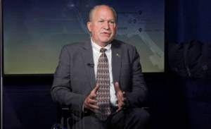 Gov. Bill Walker talks to C-SPAN host Peter Slen via webcam aboard a C-SPAN bus in Juneau on Monday, June 18, 2018. (Alex McCarthy | Juneau Empire)