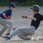 Pirates Josh Carte steals second base as Red Soxs Caden Mesdag fields the throw from home in the third inning at the Gastineau Channel Little League Junior Division Championship game at Adair-Kennedy Memorial Park on Friday. The Pirates won 8-6. (Michael Penn | Juneau Empire)