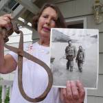 Juneauite Linda Mead Wahto holds up the very tongs her parents used to haul icebergs out of Mendenhall Lake. Ray Friedlander | For the Capital City Weekly