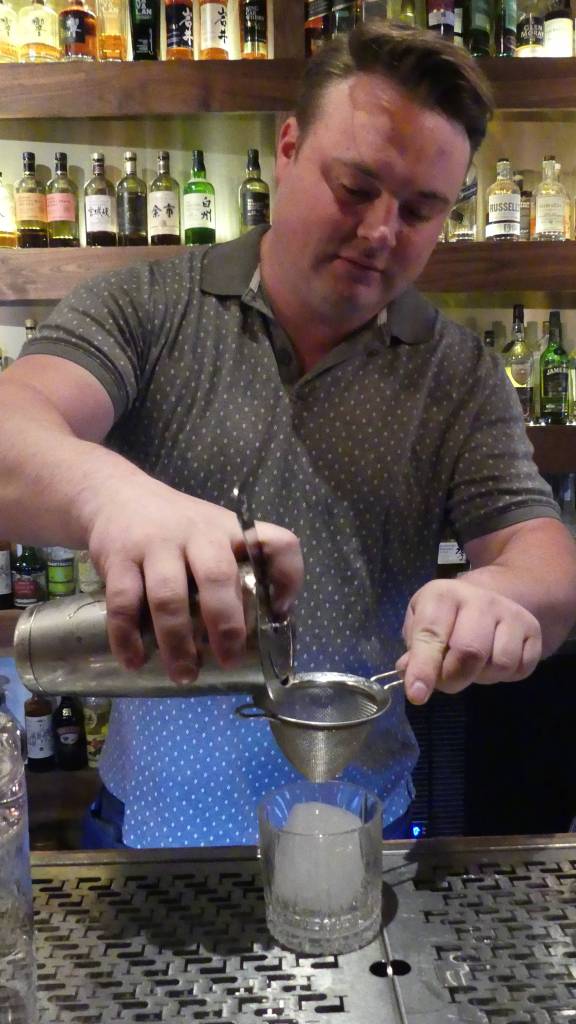 The Narrows owner Jared Curé uses a 3.5 ounce glacial ice cube in a cocktail known as Penicillin. Ray Friedlander | For the Capital City Weekly