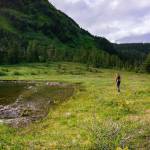 Zach Gianotti pauses to take in the view. (Gabe Donohoe | For the Juneau Empire)