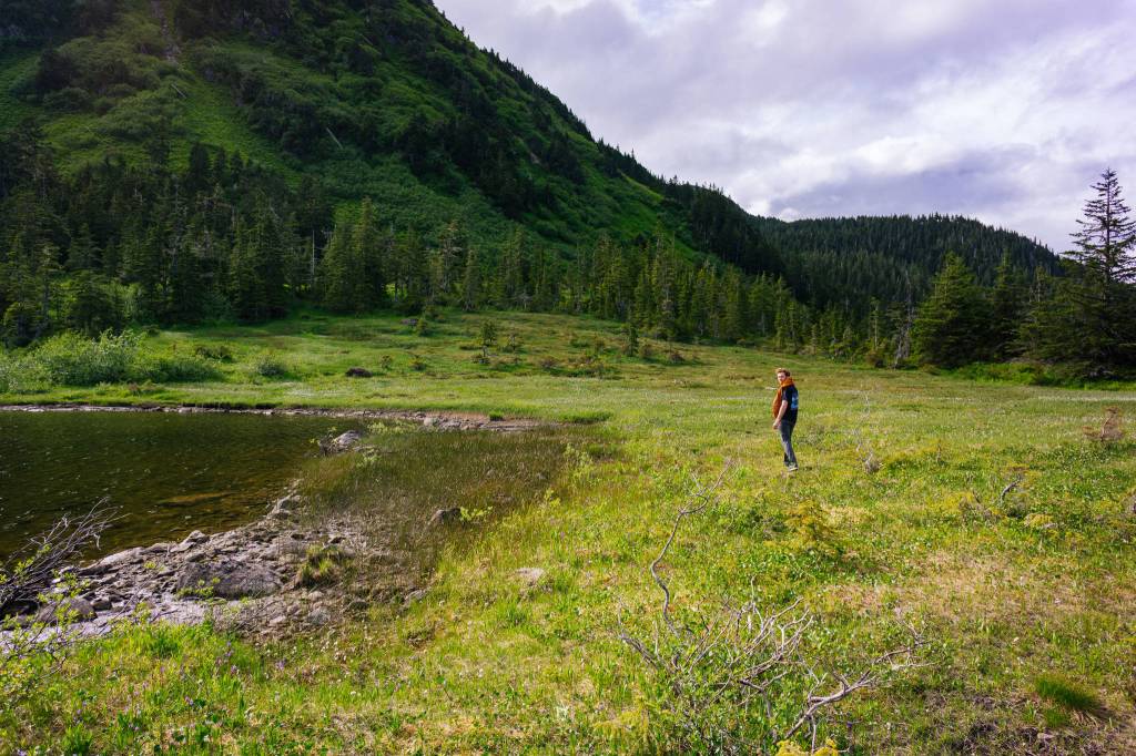 Zach Gianotti pauses to take in the view. (Gabe Donohoe | For the Juneau Empire)